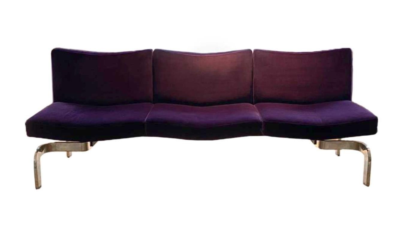 A pair of light as air sofas in faded violet velvet that appear to be floating - like butterflies. Reputedly created by Maison Jansen for a Parisian hotel lobby, and now bringing the same luxury and whimsy to your own home. The three generous