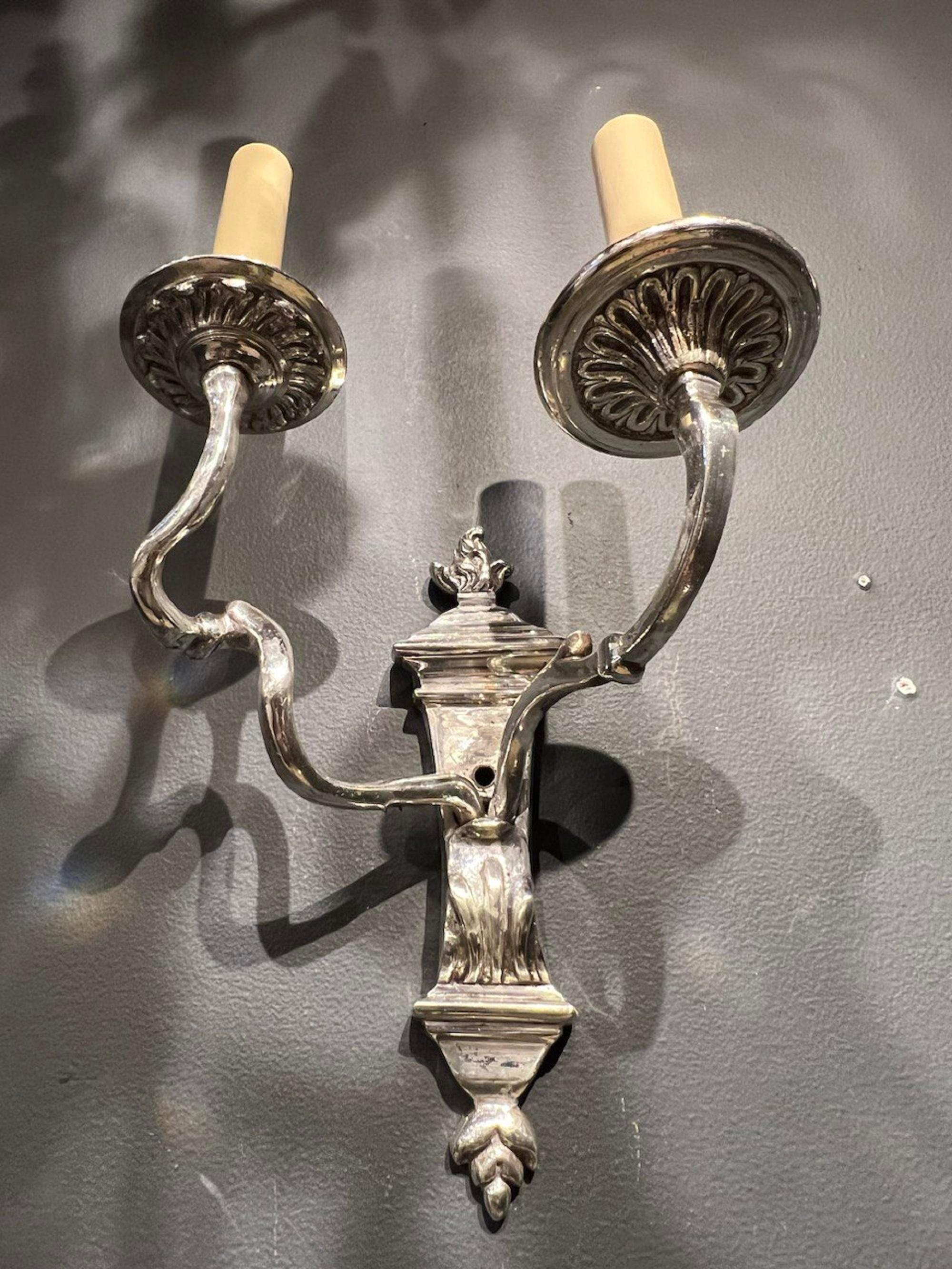 American 1920's Caldwell Silver Plated Scrolled Arms Sconces For Sale
