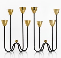 A pair of candleholders by GUNNAR ANDER