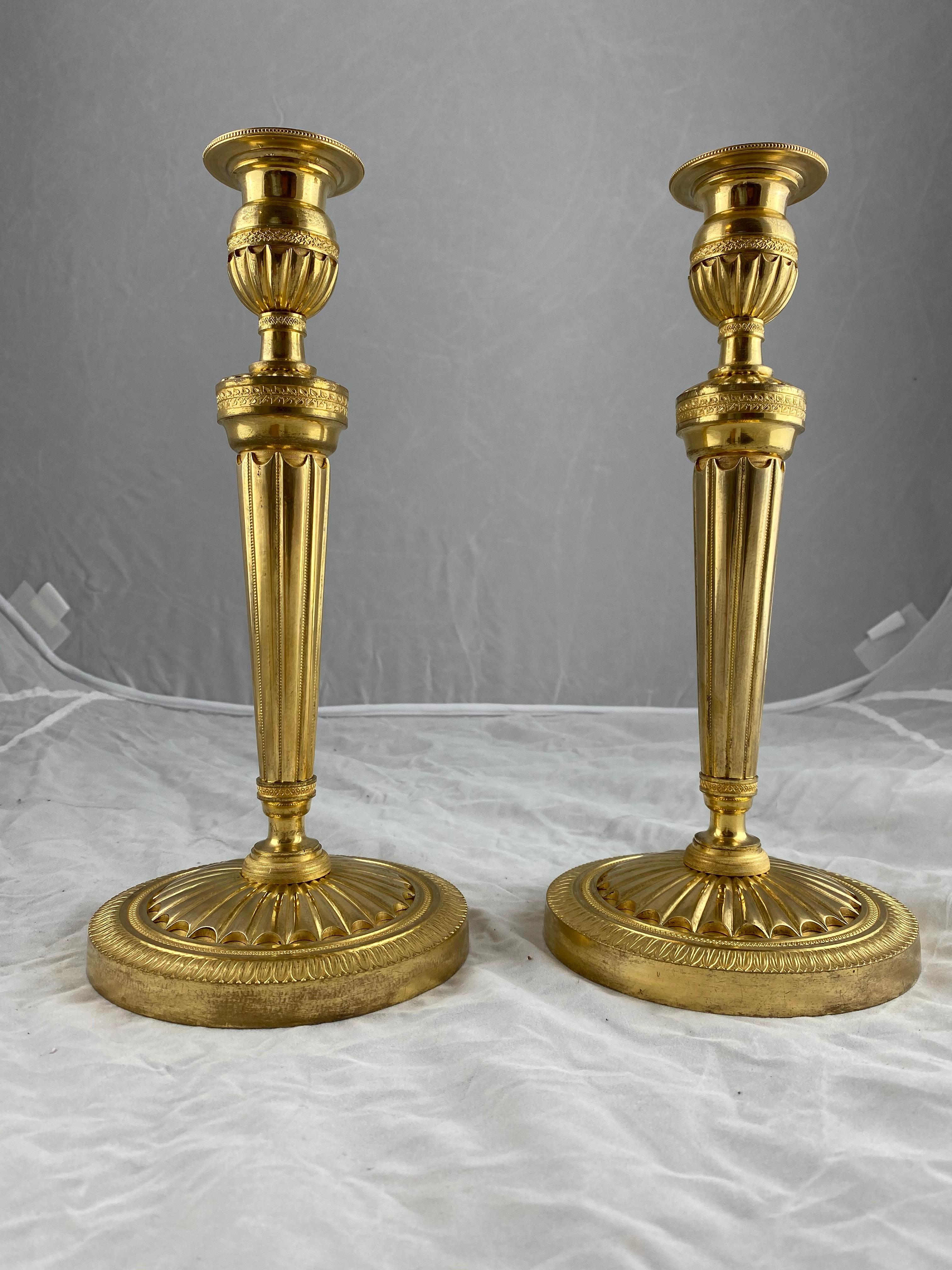 Good design, good quality. This is a pair of really nice candlesticks. Everything is right. The quality of the casting and chiseling together with the nice condition makes these a pair of keepers.