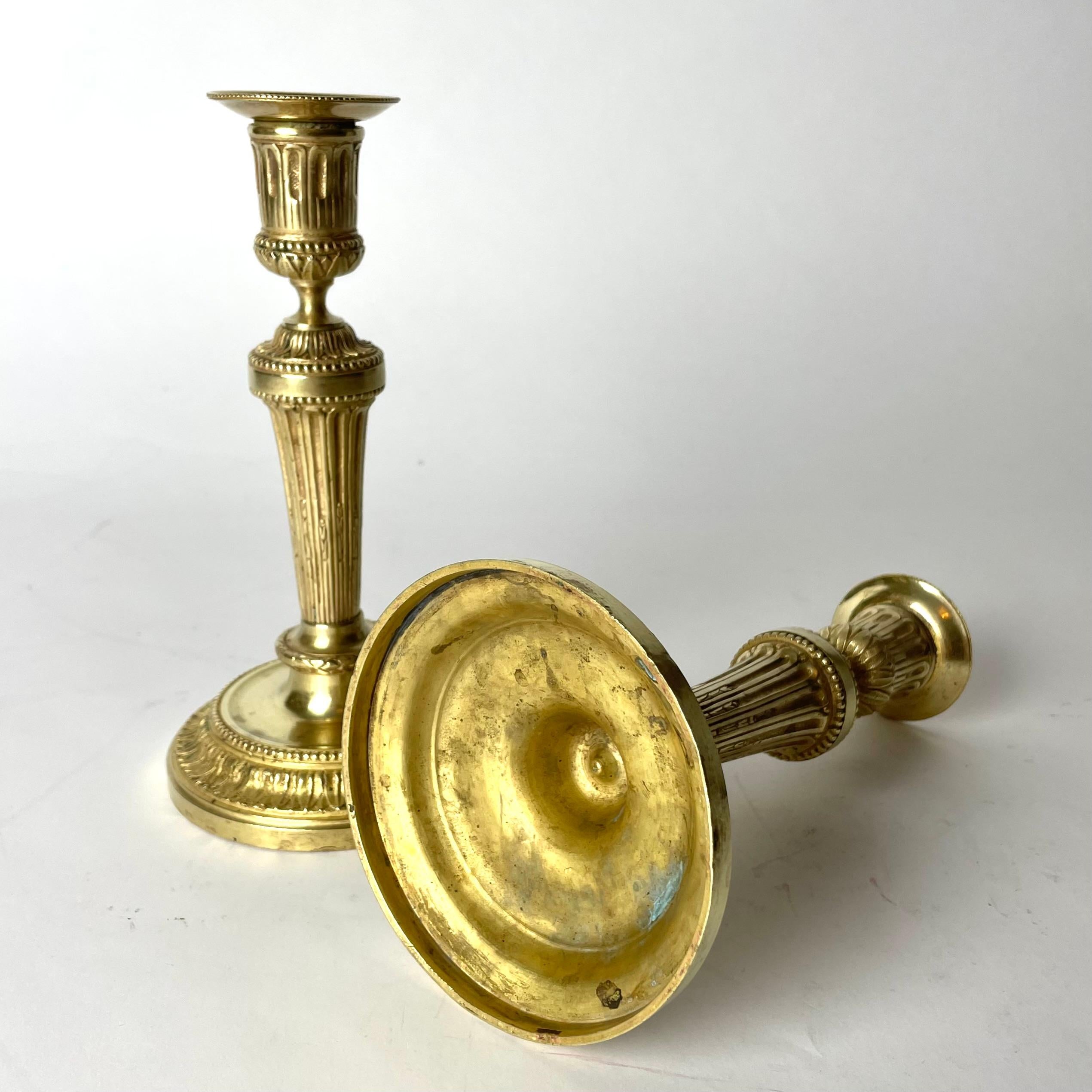 A Pair of Candlesticks in Gilt Bronze, 19th Century, in the style of Directoire For Sale 3