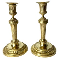 Antique A Pair of Candlesticks in Gilt Bronze, 19th Century, in the style of Directoire