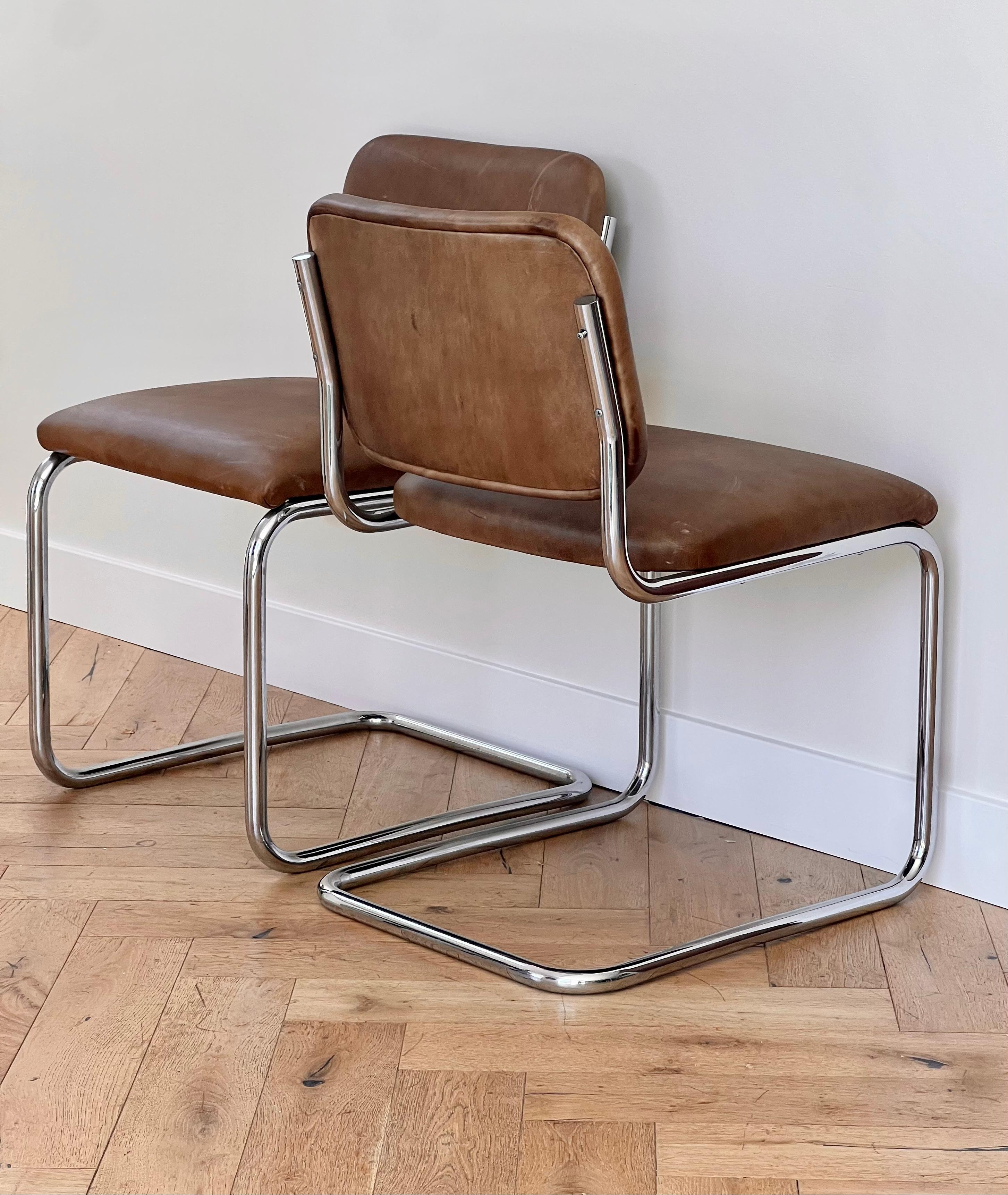 Unknown A pair of cantilever Cesca style chrome and leather chairs, 20th century For Sale