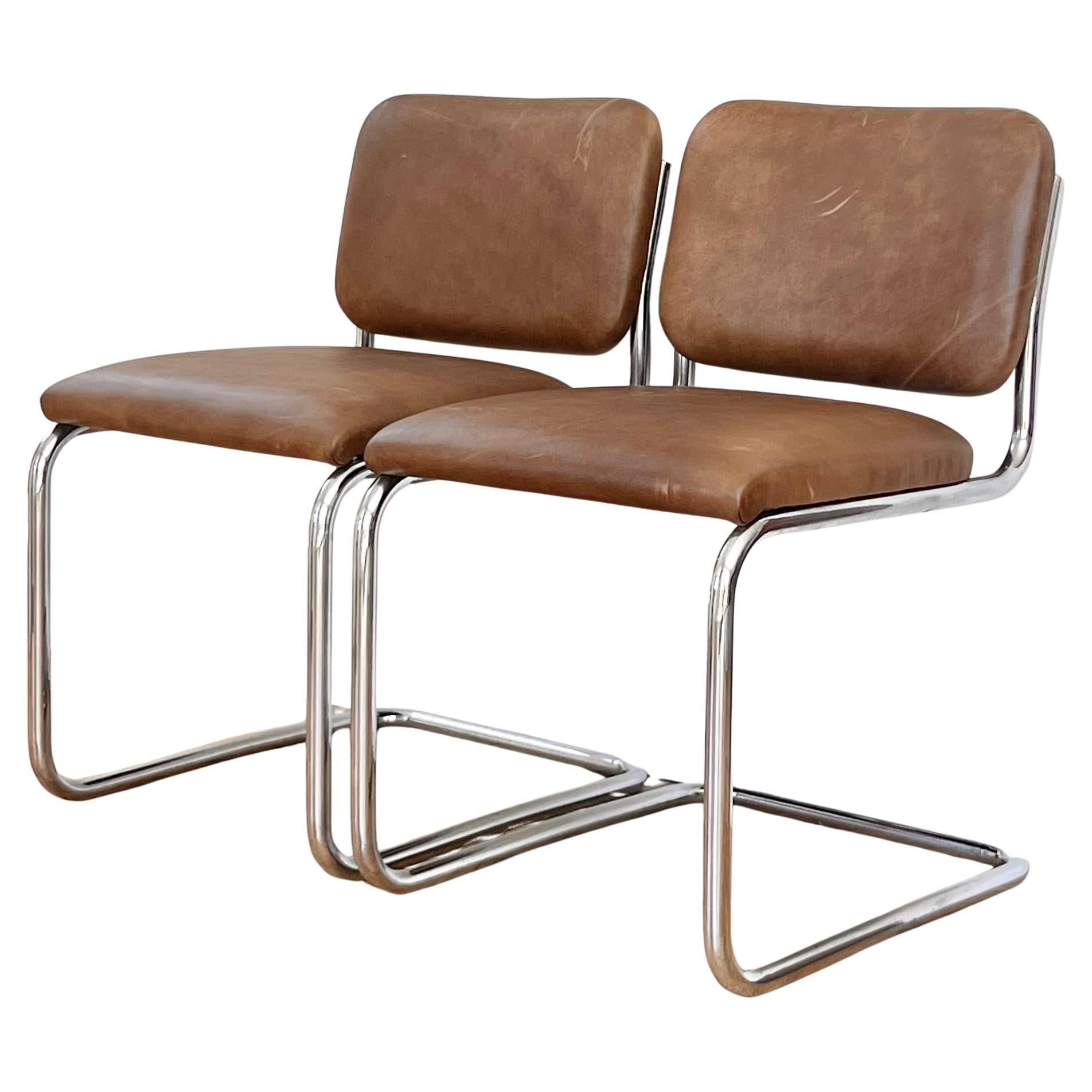 A pair of cantilever Cesca style chrome and leather chairs, 20th century