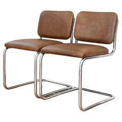 A pair of cantilever Cesca style chrome and leather chairs, 20th century