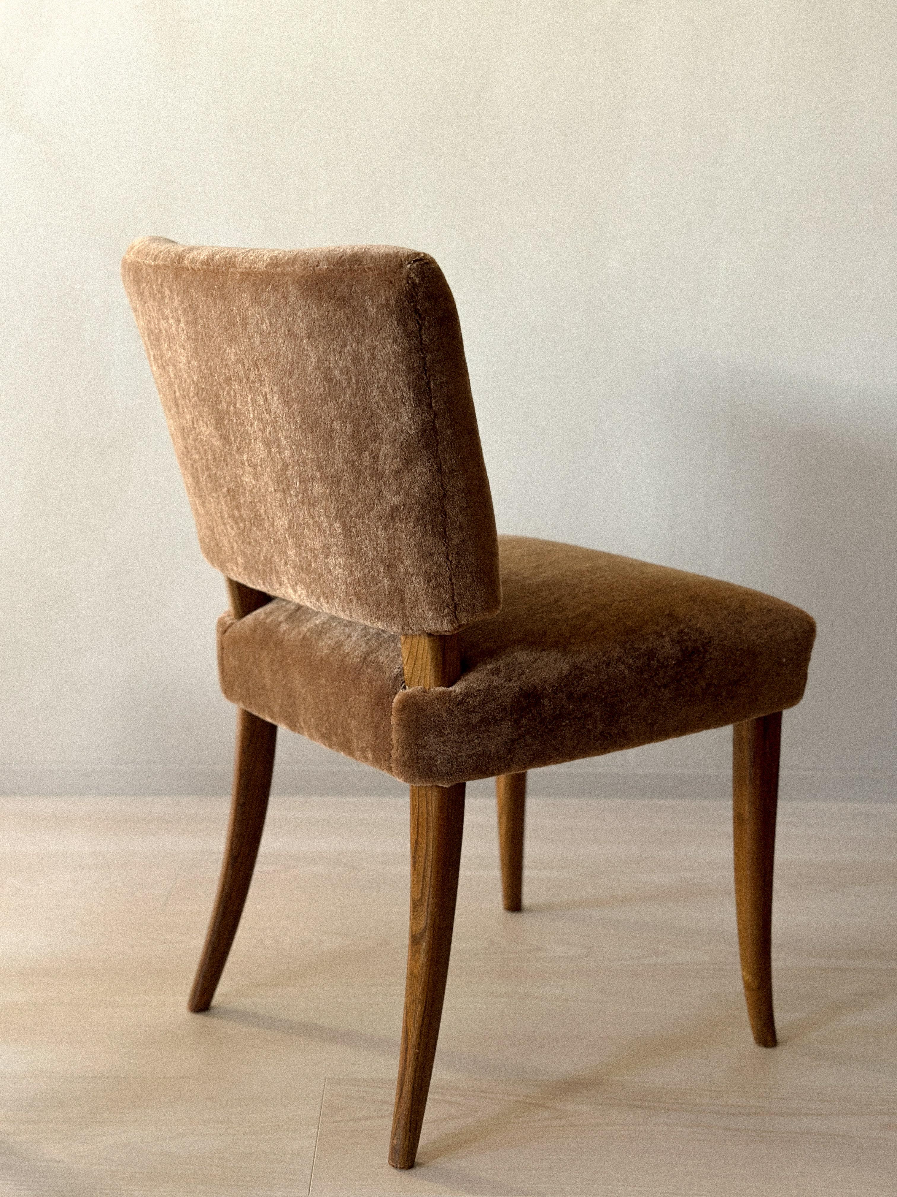 A Pair of Carl-Johan Boman Dining Chairs for Oy Boman Ab. Newly reupholstered in premium Alpaca.

 