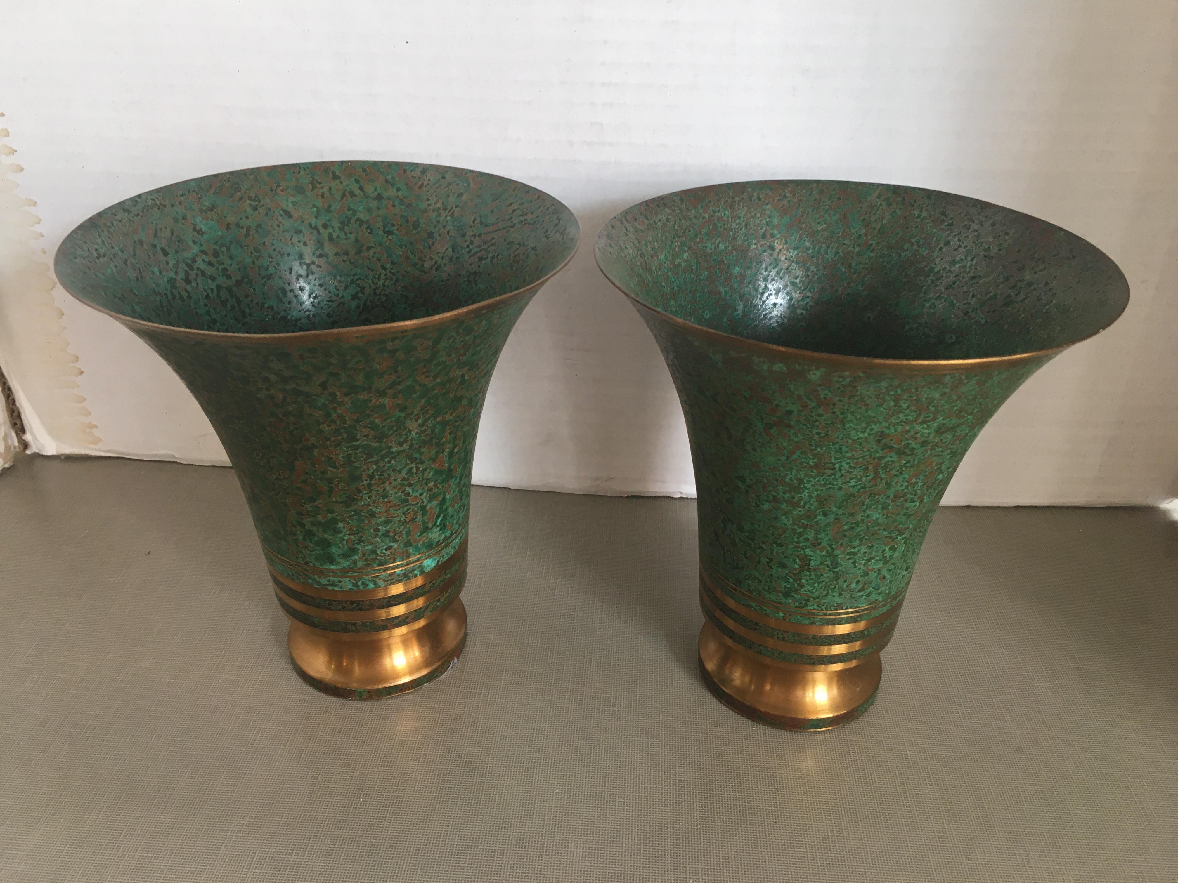 A pair of Carl Sorensen bronze flared vessels.