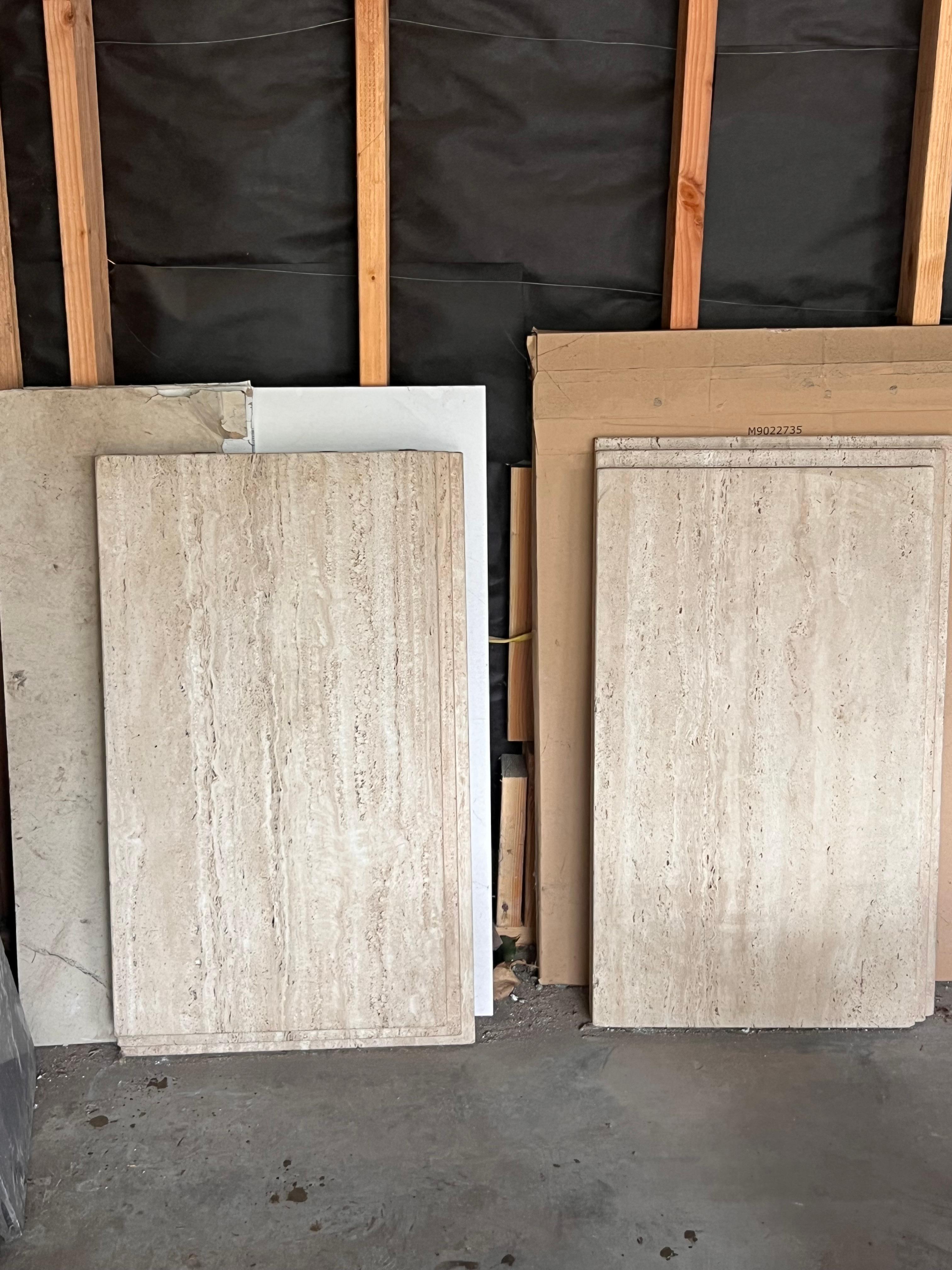 A pair of mid century Carlo Scarpa style graduated travetine pieces for table or siding. Circa 1970. Valuable, gorgeous architectural elements that can be used to adorn furniture, decor, or even within the design/build of an interior. 
Each