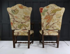A Pair Of Carolean Style Armchairs
