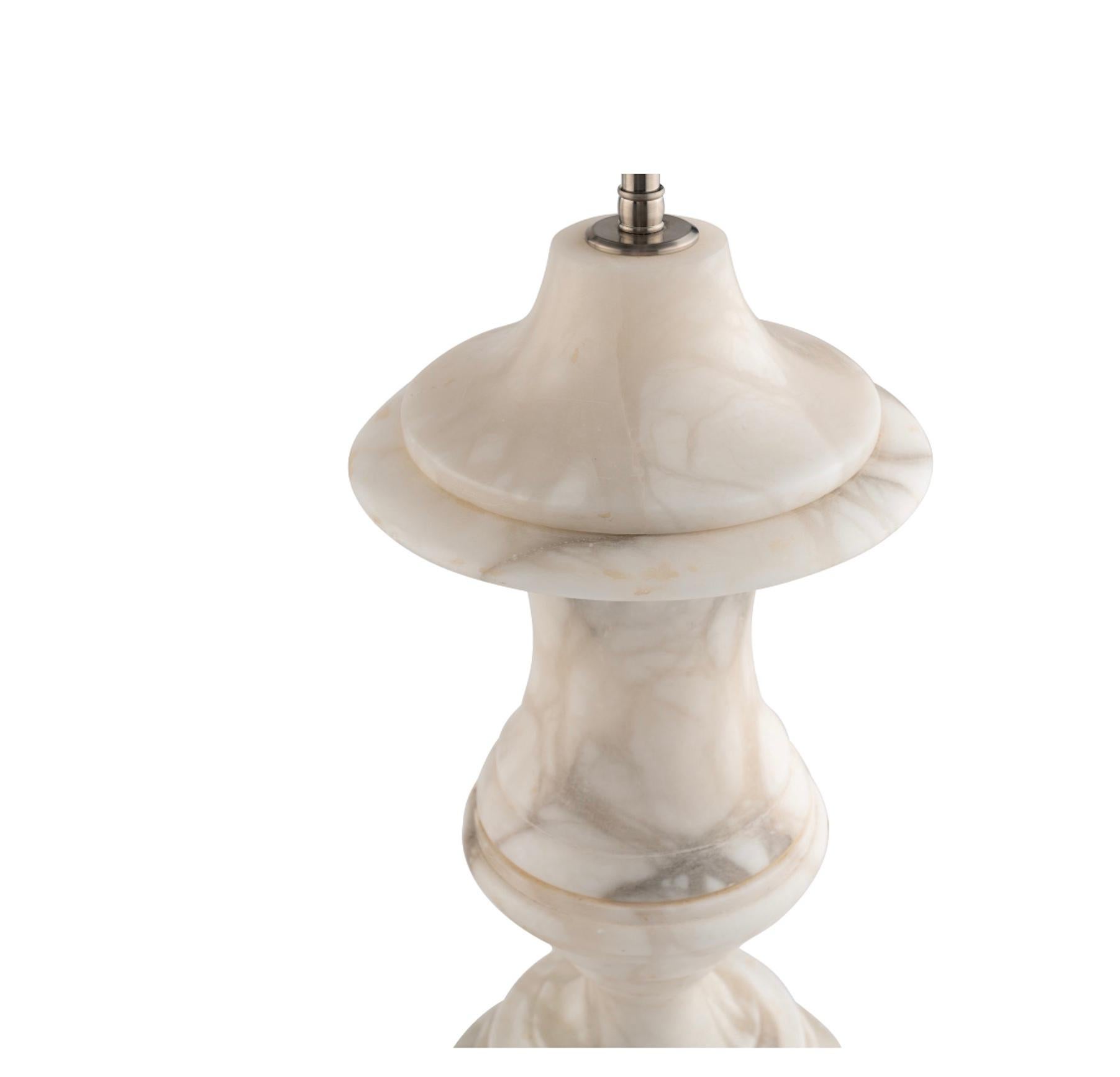 A Pair of Carrara Urn Lamps 20th Century from a David Easton-designed interior. In Excellent Condition In Buchanan, MI