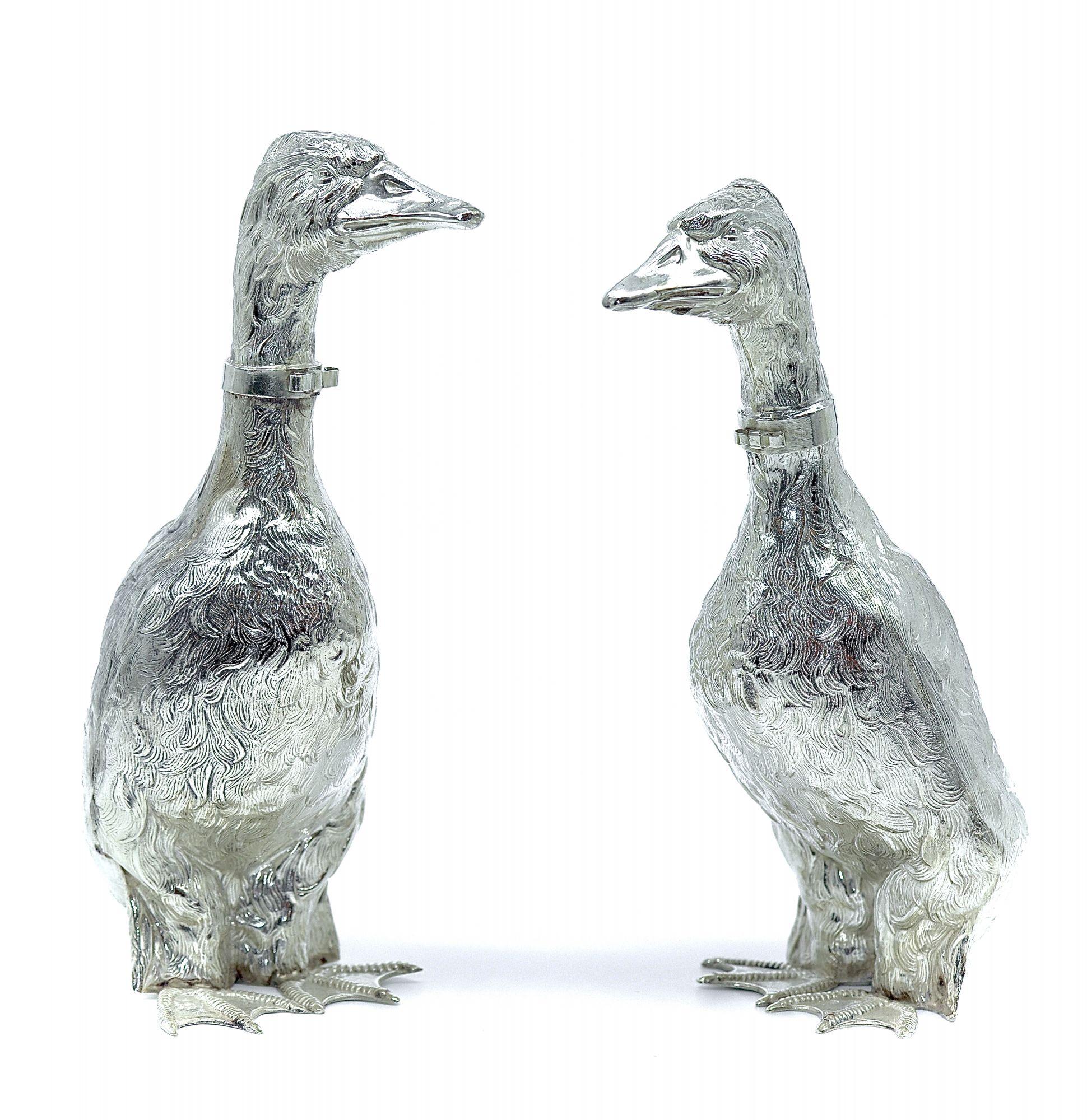 This beautifully executed pair of decanters were modeled after ducks, they added a whimsical twist by adding a bow tie around their necks. These were made for the American market during the prohibition era as the liquor they would be filled with