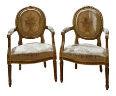 Pair of Carved and Giltwood Louis XVI Style Fauteilles