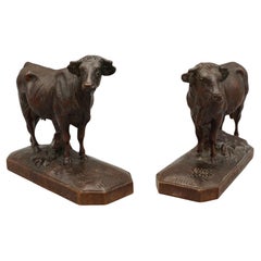 A Pair of Carved Linden Wood Black Forest Cow and Bull Dated 1903