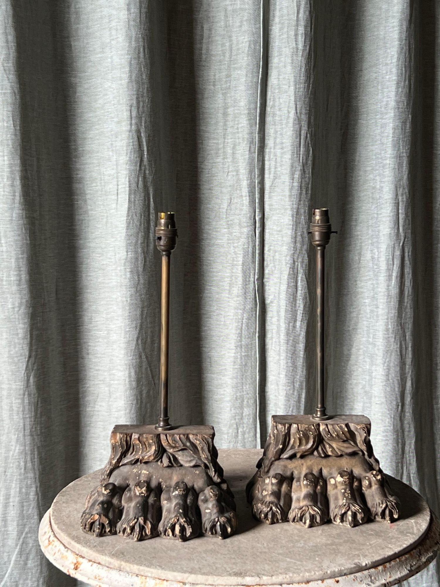 18th Century and Earlier A pair of carved lions paw lamp bases