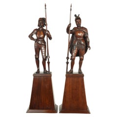 Antique A pair of carved walnut mediaeval knights