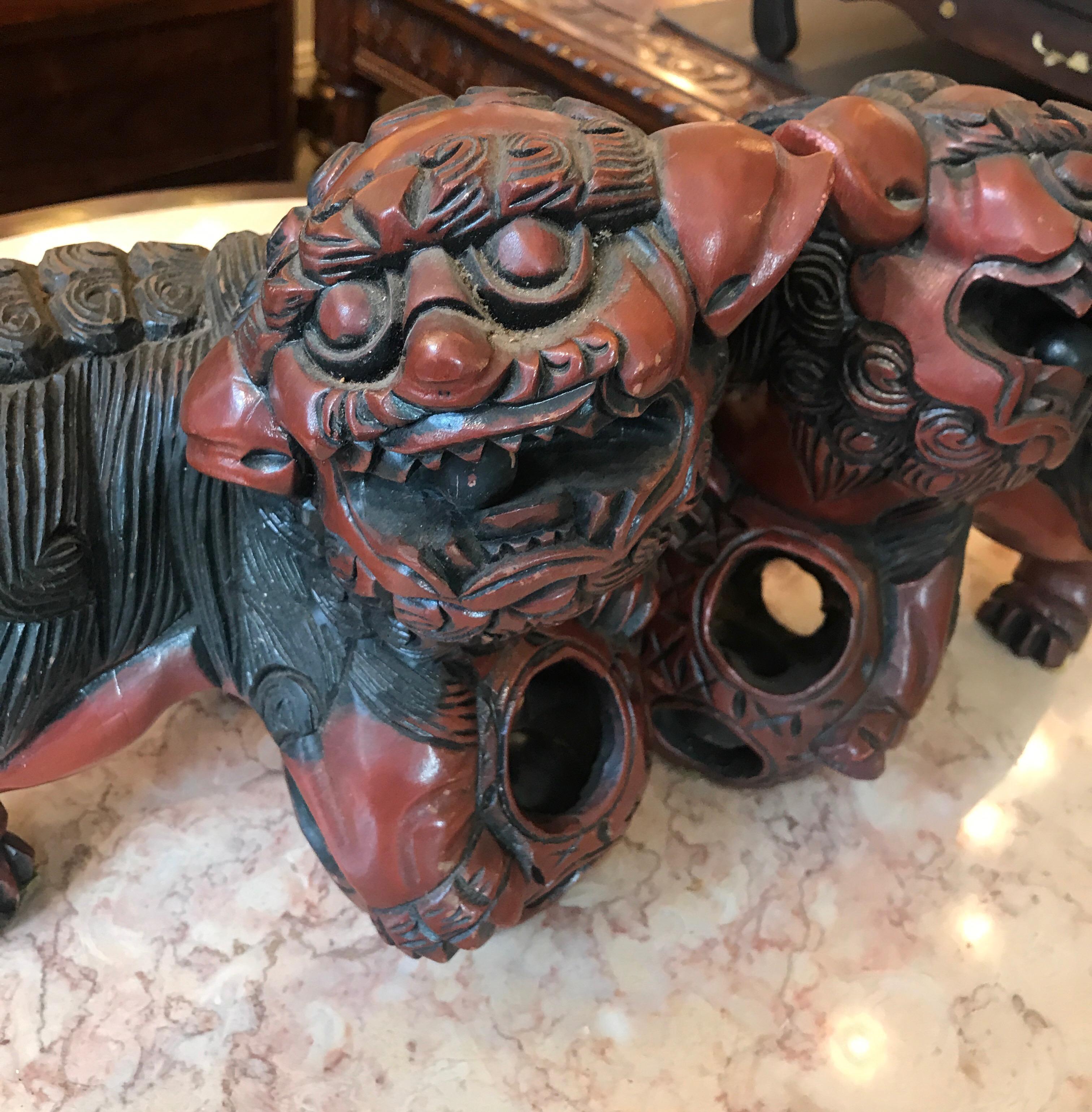 Chinese Pair of Carved Wood and Lacquered Foo Dogs