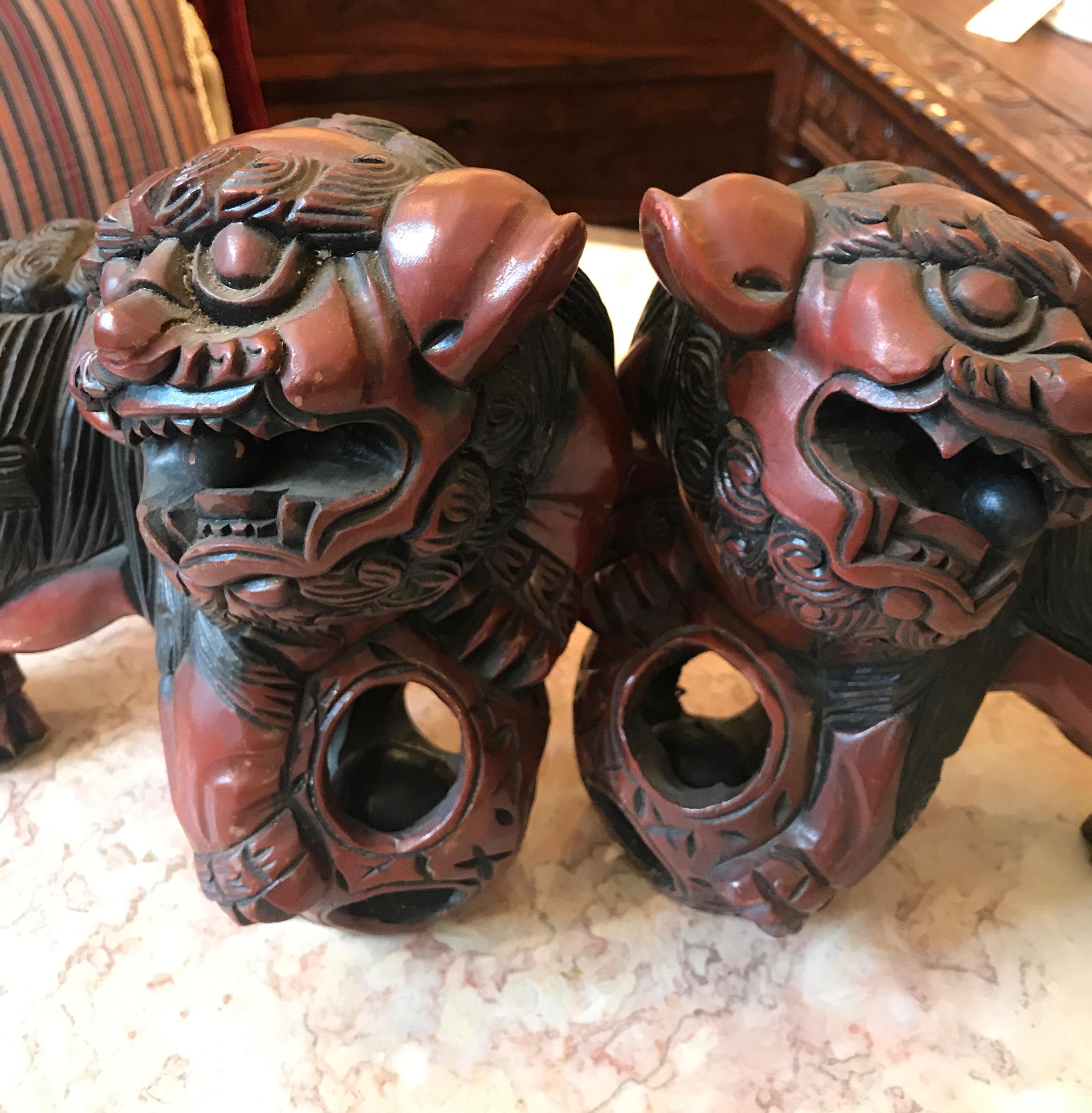 Pair of Carved Wood and Lacquered Foo Dogs 1