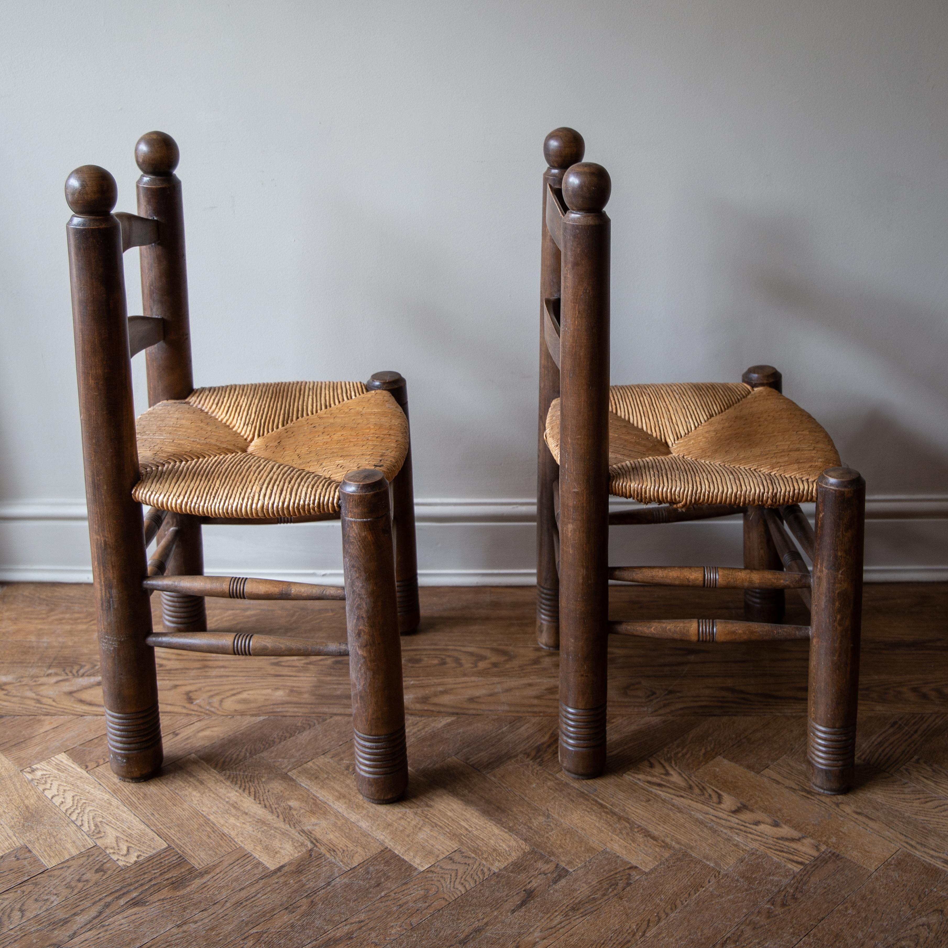 Primitive A pair of Catalan Racionalist Walnut and Rush Seated Finca Chairs, circa 1950