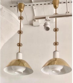 Una coppia di lampade da soffitto di Paavo Tynell modello K2-20