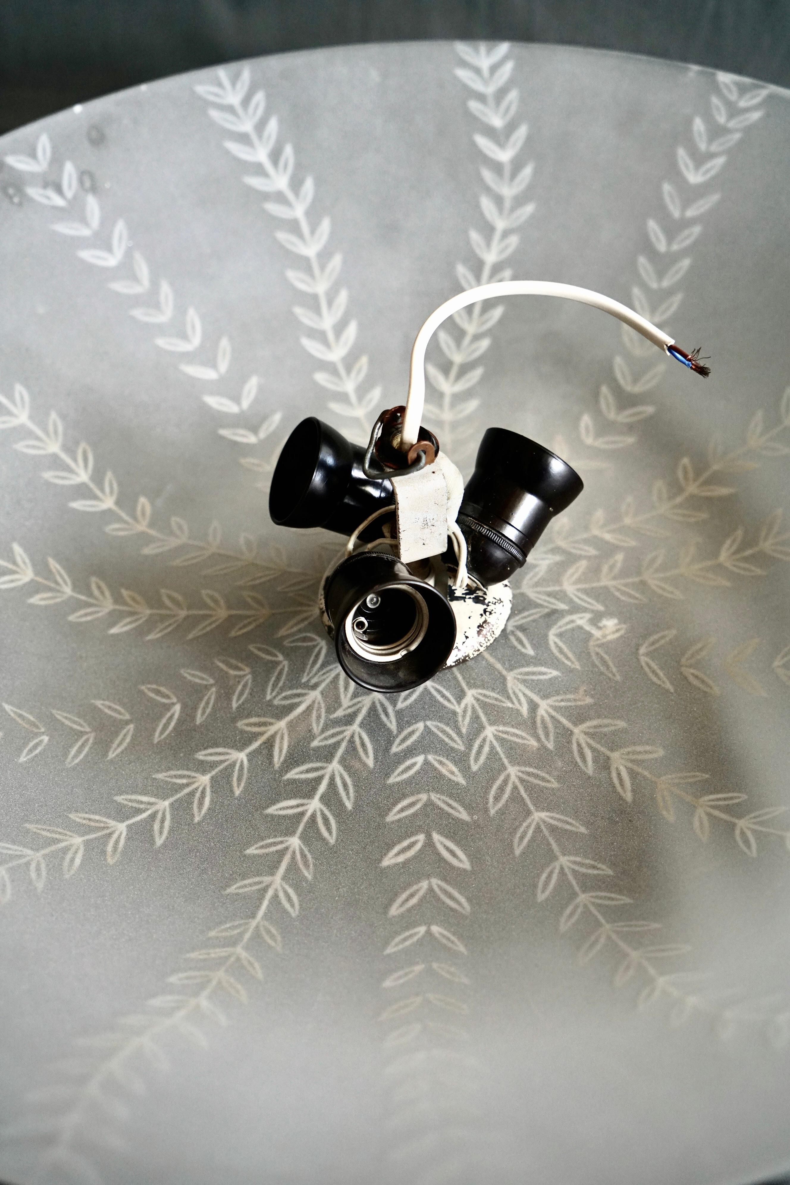 Glass A pair of ceiling light by Lisa Johansson-Pape For Sale