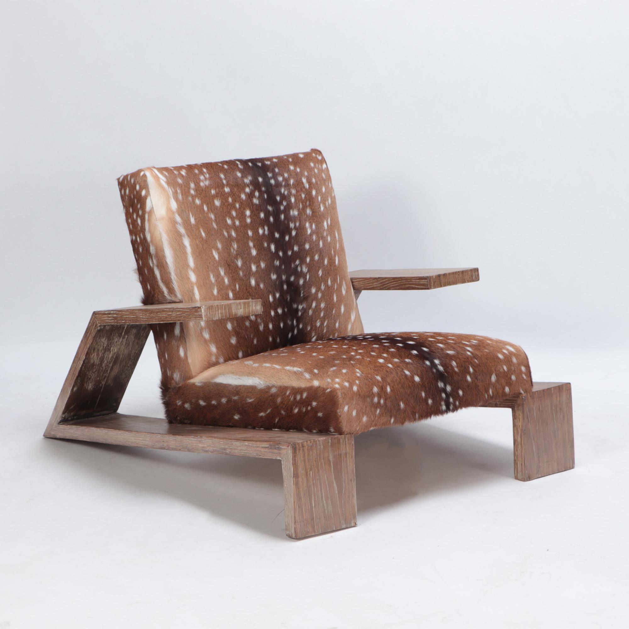 A Pair of cerused oak and deer hide chairs originally designed for the Llao Llao hotel in Argentina.