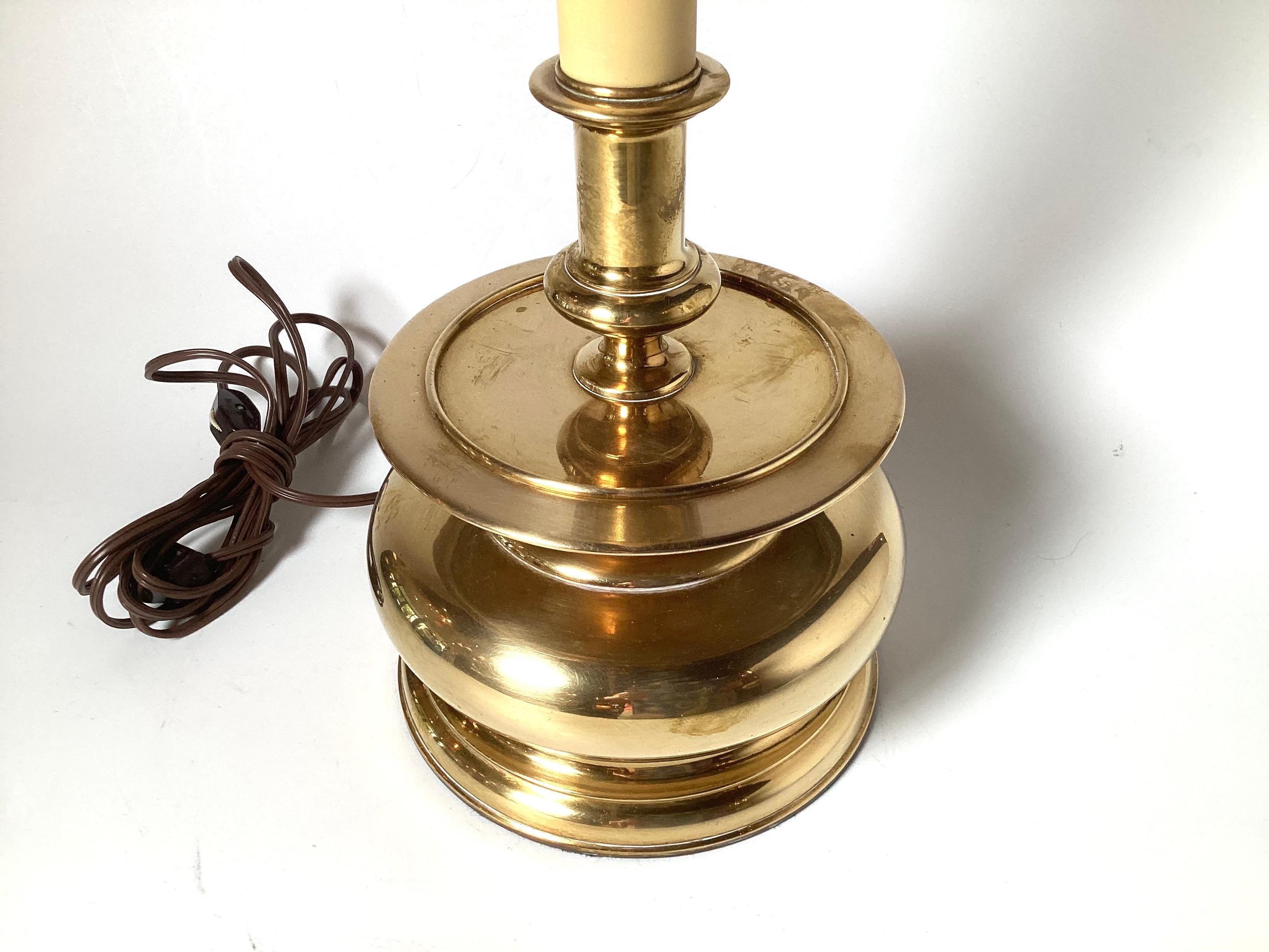 American A Pair of Chapman Tall Buffet Cast Brass Table Lamps with Original Black Shades