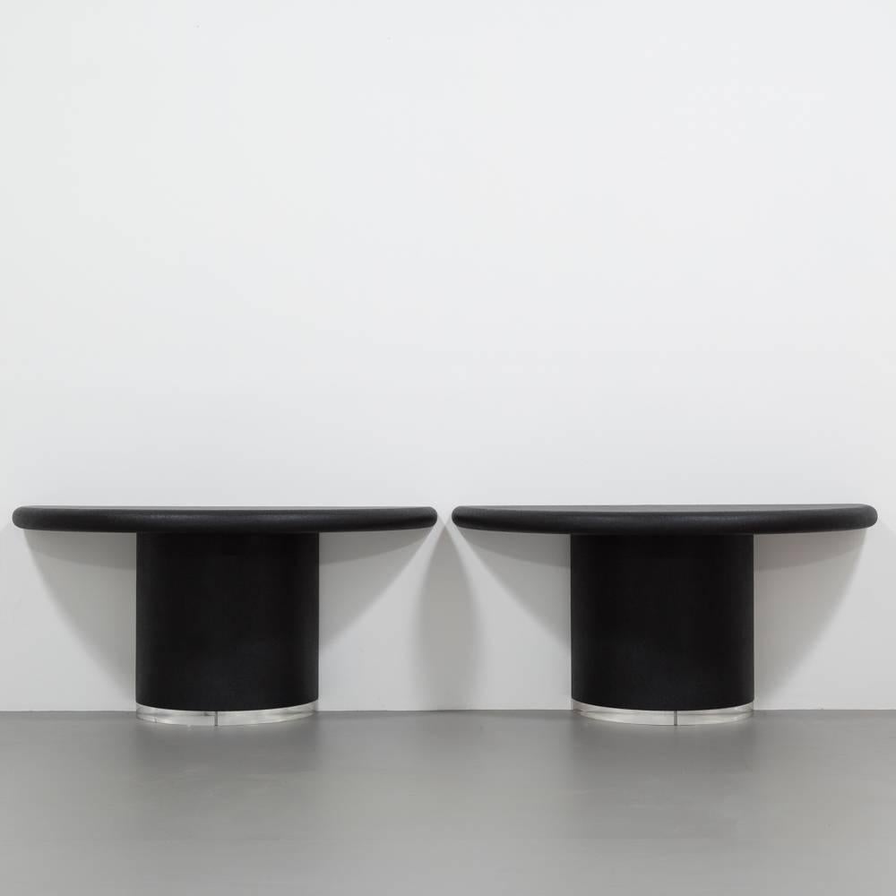 A pair of Rattan and Lucite based console tables finished in a soft charcoal shade. The scale of these bold tables has to be seen. Dating from the 1970’s they exemplify Springer’s work. In super condition a rare opportunity to acquire a work of this