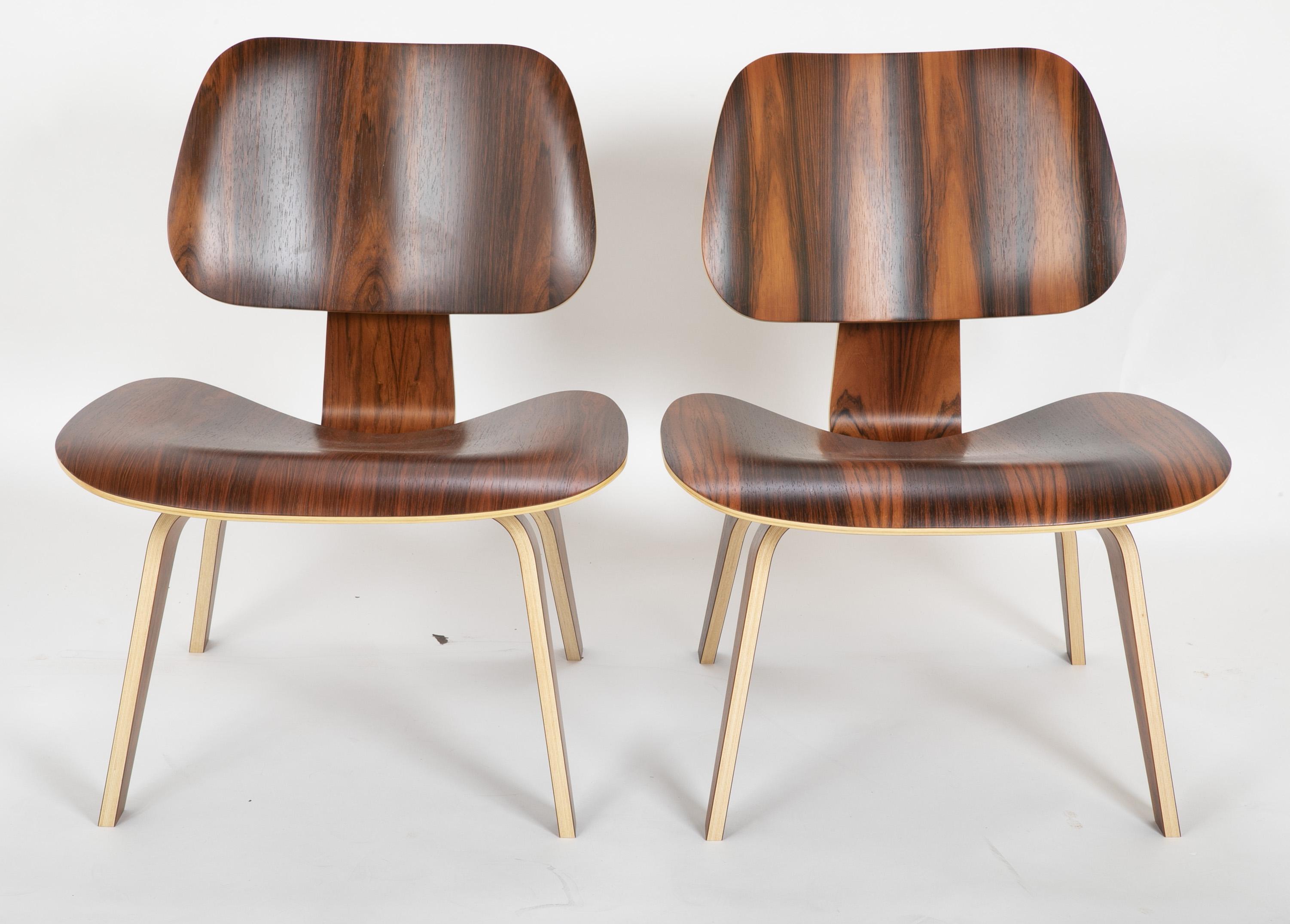 A pair of limited edition (39 & 61 of 500) rosewood LCW chairs designed by Charles and Ray Eames. Designed in the USA, 1946 made in 1996.

 
