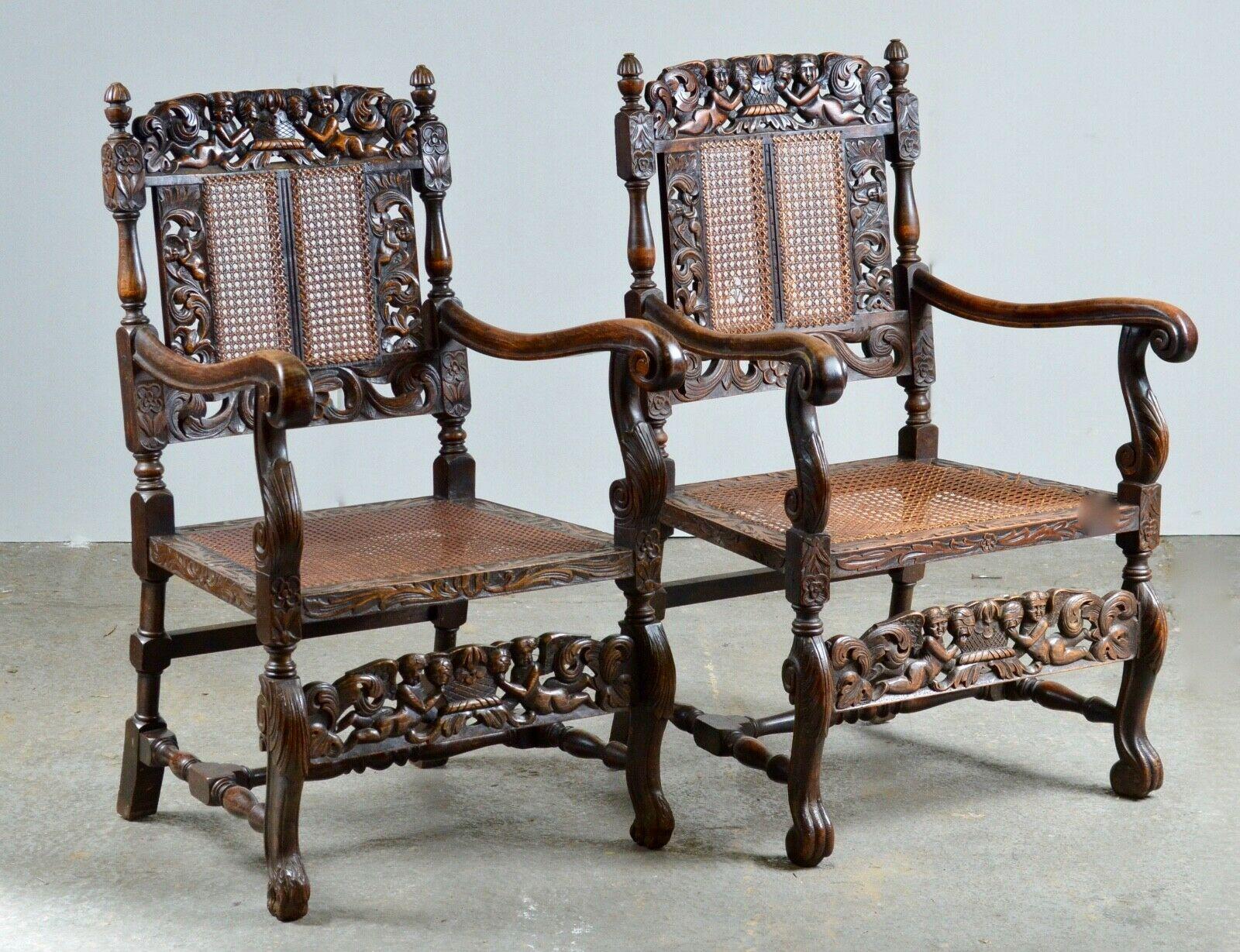 We are delighted to offer for sale this stunning pair of Charles 2nd high walnut armchairs circa 1900. Beautifully carved and shaped frame with angels, flowers, leaf detail to the arm fronts and rear legs, shaped mid and side stretchers and carved