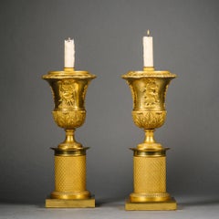 Paire de cassolettes / chandeliers réversibles en bronze doré Charles X