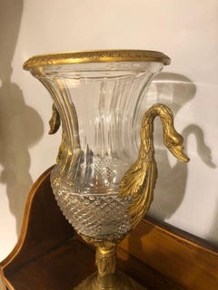 A pair of Charles X period cut glass and gilt bronze urns, French c.1825