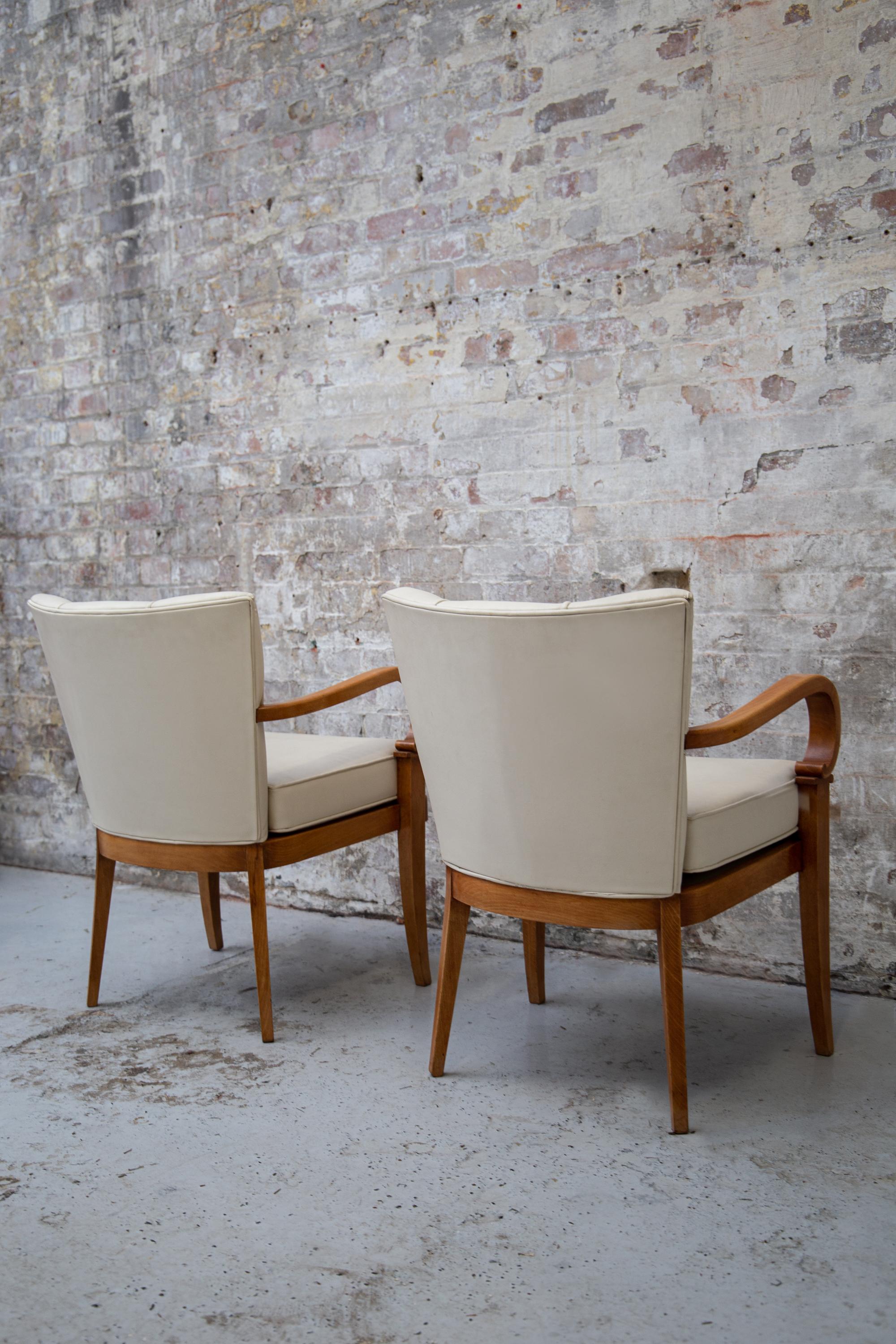A Pair of Cherrywood Armchairs attributed to Etienne-Henri Martin, circa 1937 For Sale 1