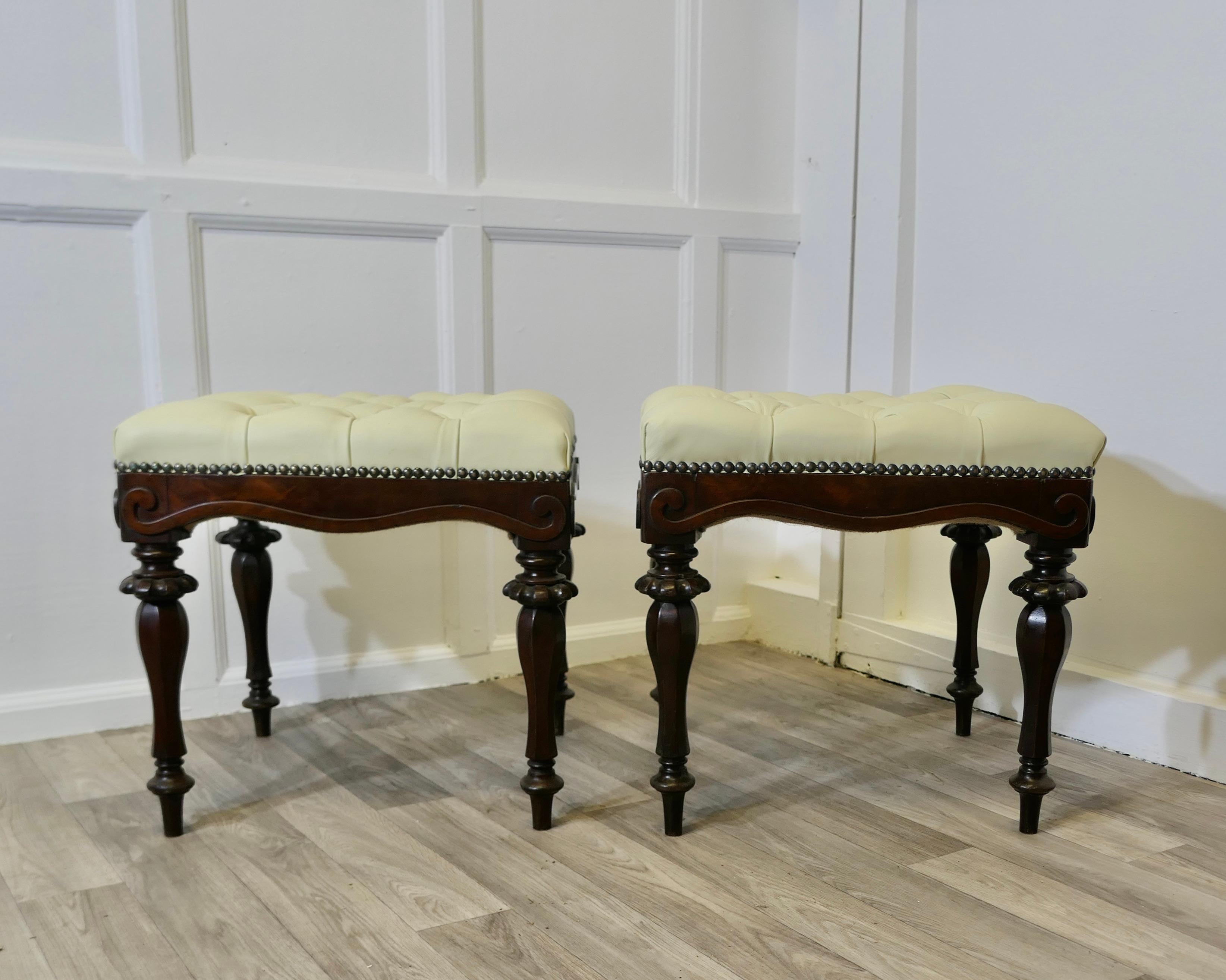 A Pair of Chesterfield Buttoned Leather Walnut Library Window Stools

A Lovely pair, these very attractive Victorian stools are made in Walnut, they stand on elegant turned legs and a delightful scalloped shape to the apron The stools have been