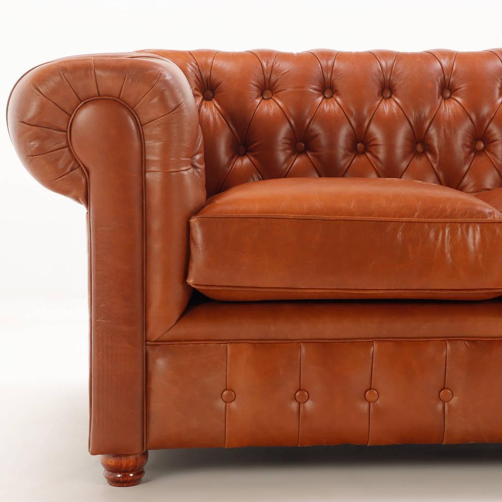 Argentine A pair of Chesterfield style leather sofas. For Sale