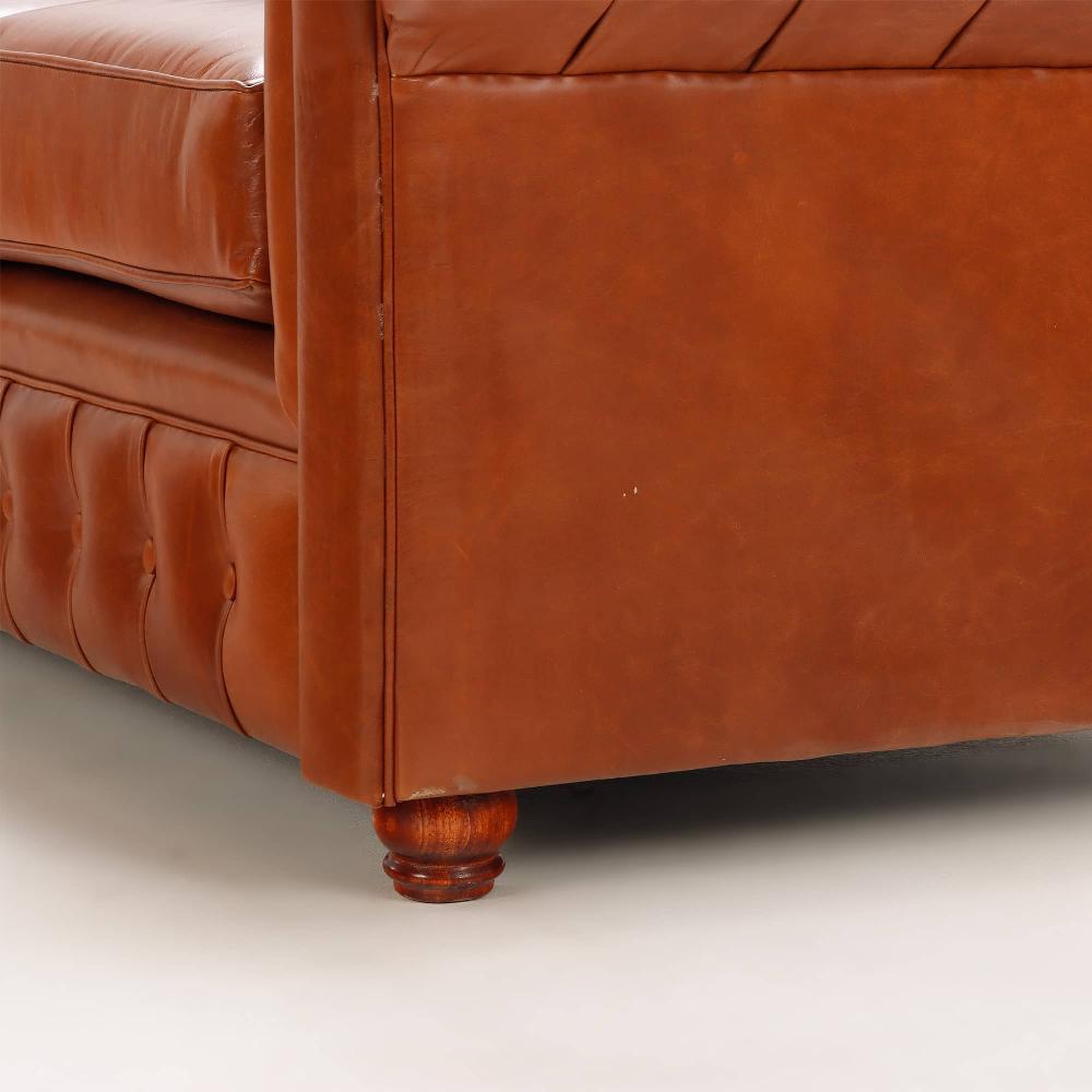 Leather A pair of Chesterfield style leather sofas. For Sale