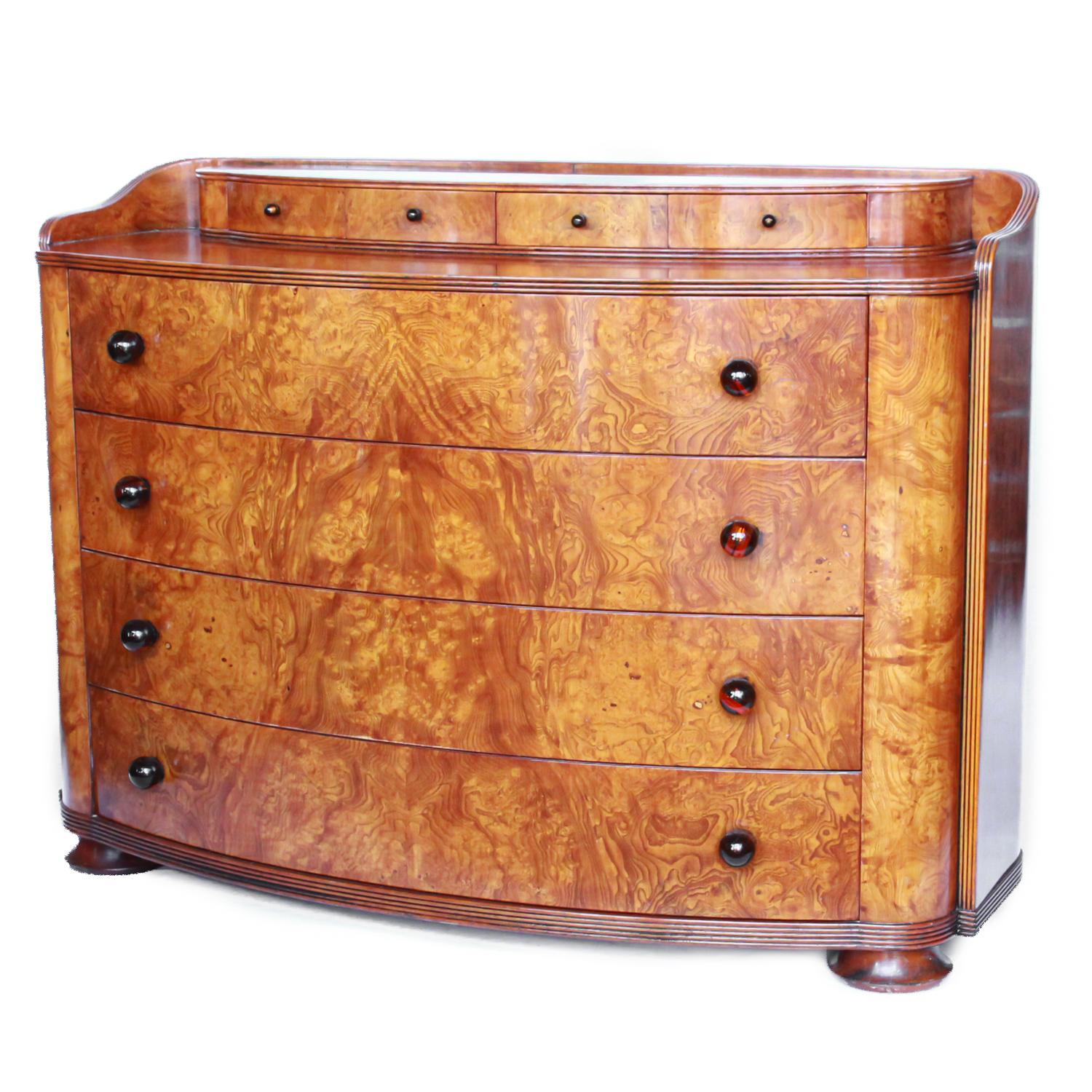 A pair of Art Deco style chests of drawers with burr elm veneers surrounding entire chests. Original amber style handles. Excellent quality and proportions.

Date: circa 1970

Origin: English

Dimensions: H 87cm, W 120cm, D 47cm

Item no: