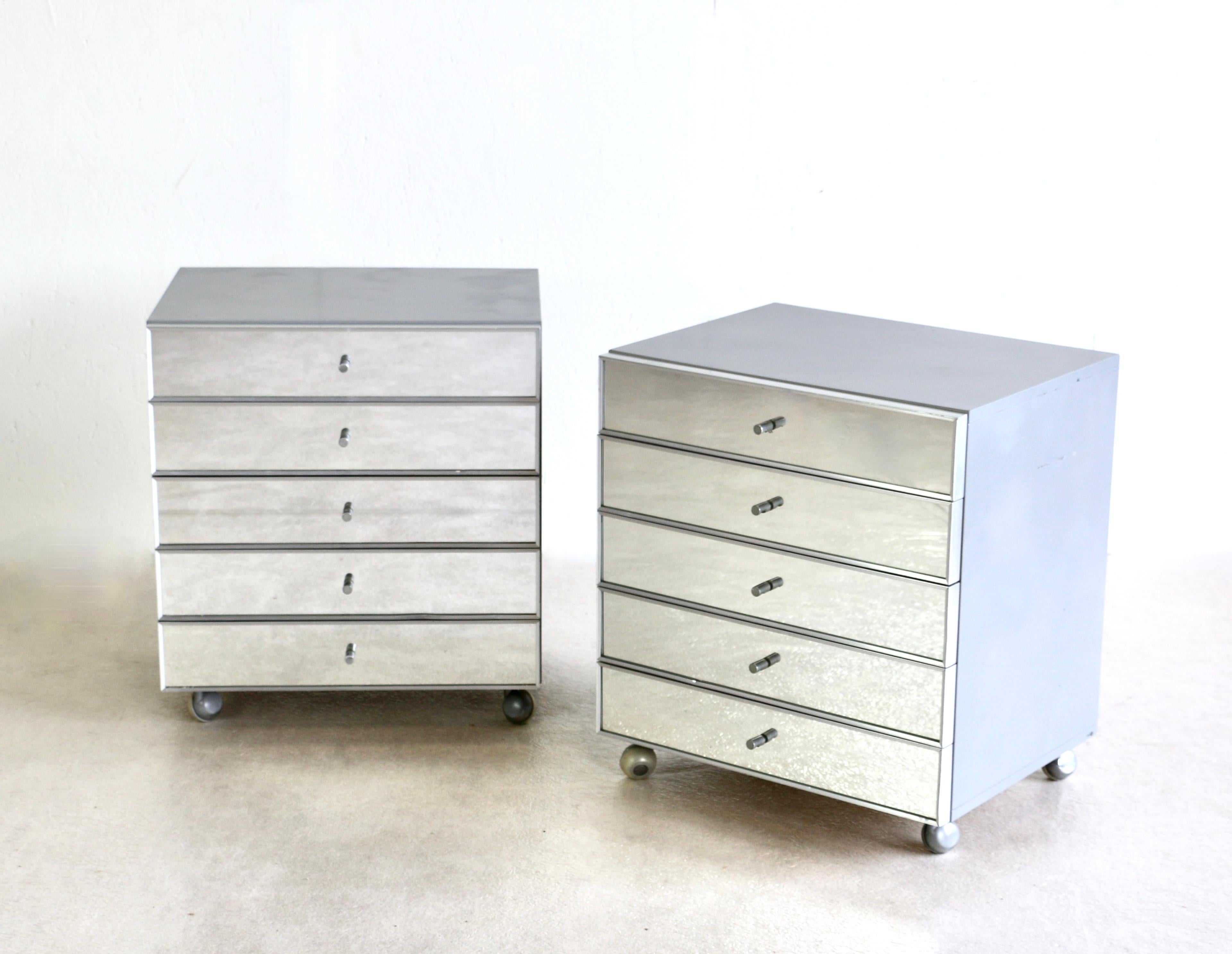 Mirror A pair of chests of drawers. Germany 1980s. For Sale