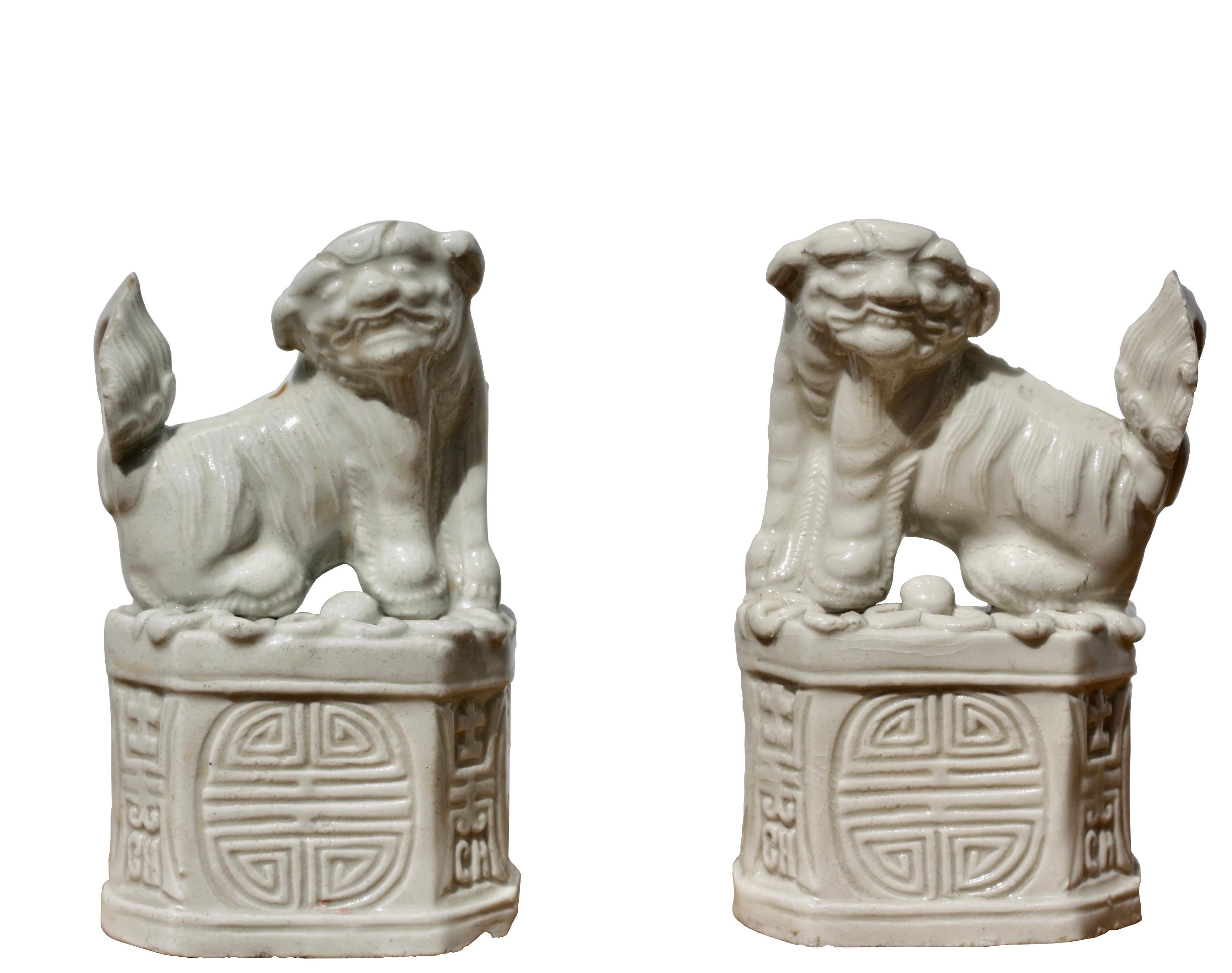 20th Century Pair of Chinese 'blanc-de-chine' 'Buddhist Lion' Joss Stick Holders For Sale
