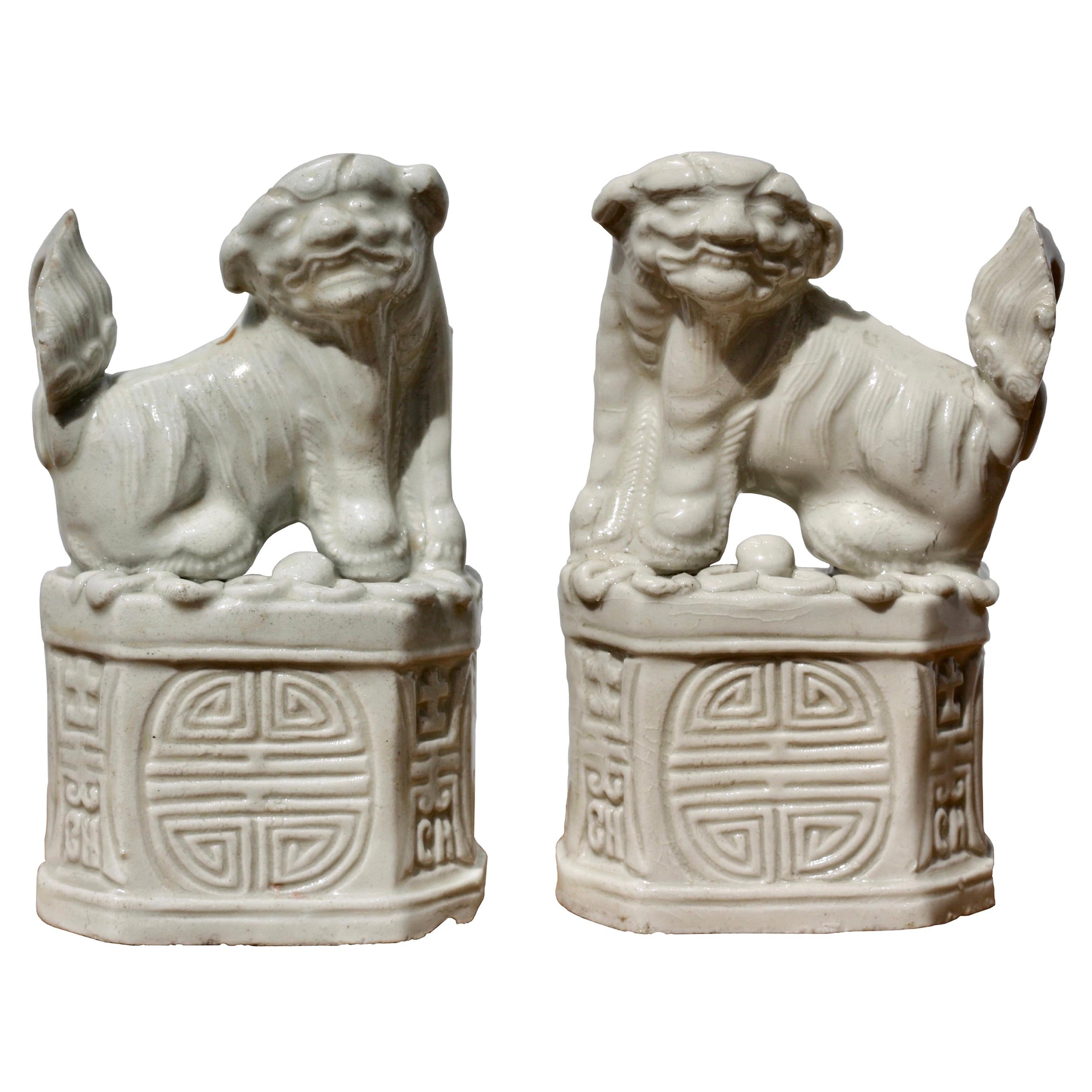 Pair of Chinese 'blanc-de-chine' 'Buddhist Lion' Joss Stick Holders