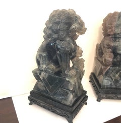 Pair of Chinese Carved Green Quartz Foo Dogs