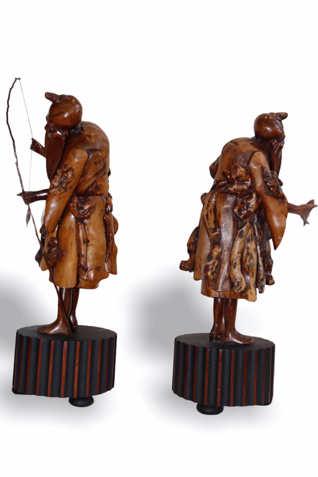 Japanese Pair of Chinese Carved Root Wood Fishing Monks on Lacquered Bases, 19th C