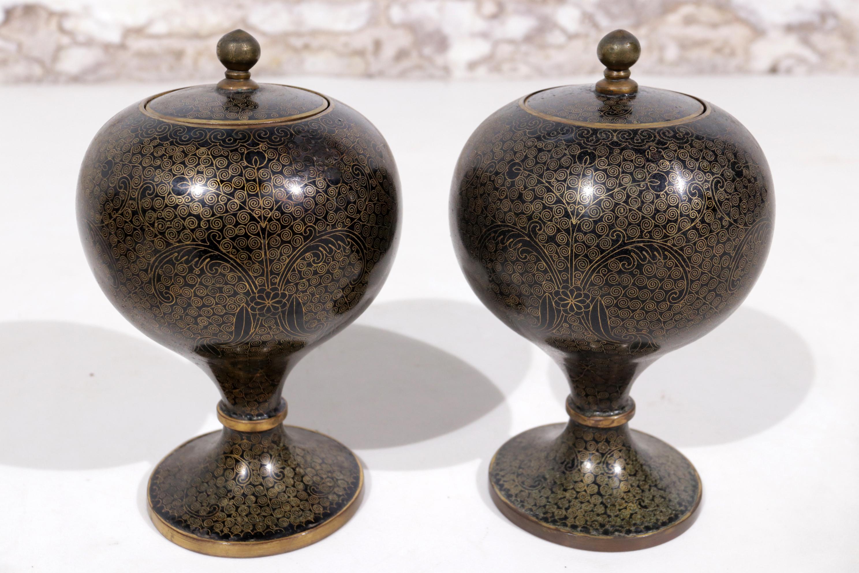 Very decorative Chinese cloisonne enamel jars and covers, early 20th century.
each of globular form on a tapering stem and circular foot.
Gold / black and rich blue inside.