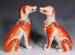 Pair of Chinese Export Porcelain Figures of Seated Hounds Qianlong, 18th Century
