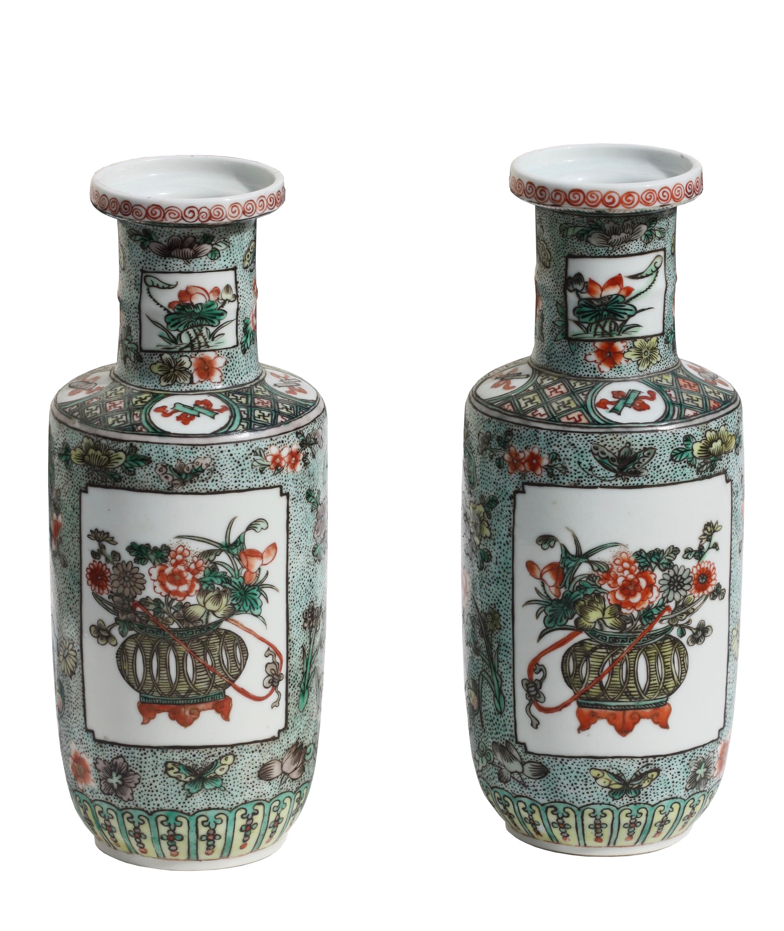 A pair of Chinese famille verte porcelain vases
19th century 
Of rouleau form, painted with reserves of flower baskets.
Height 9.75 in. (24.76 cm.) 
Provenance: Estate of Laura Speiser, NY.