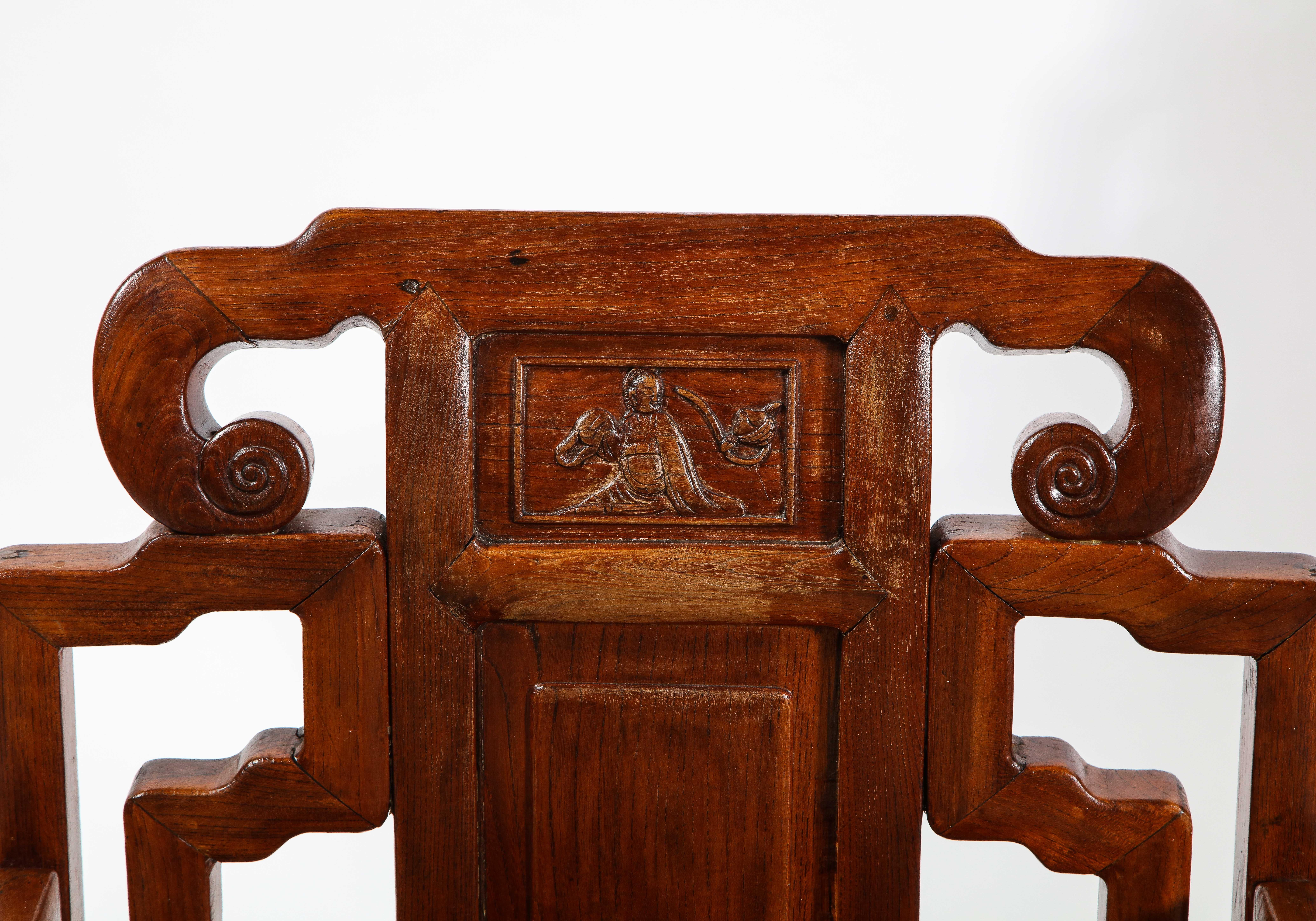 Pair of Chinese Hardwood Chairs with Fretwork Designs and High Relief Panels In Good Condition For Sale In New York, NY