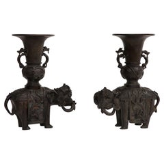 A Pair of Chinese Ming Period Patinated Bronze Enameled Elephant Vases/Censors