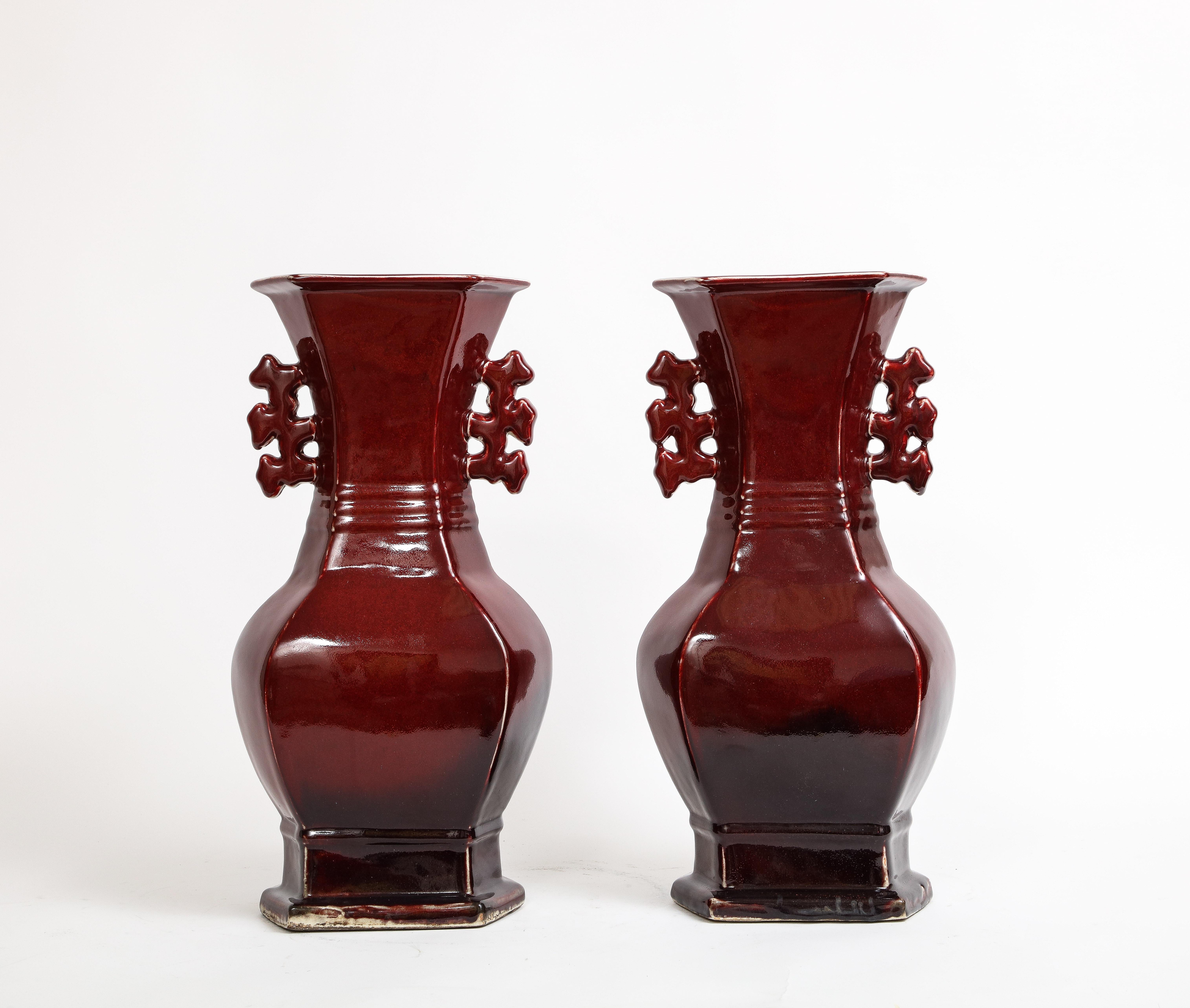 Pair of Chinese Monochrome Ox Blood Porcelain Double Handled Vases For Sale 1