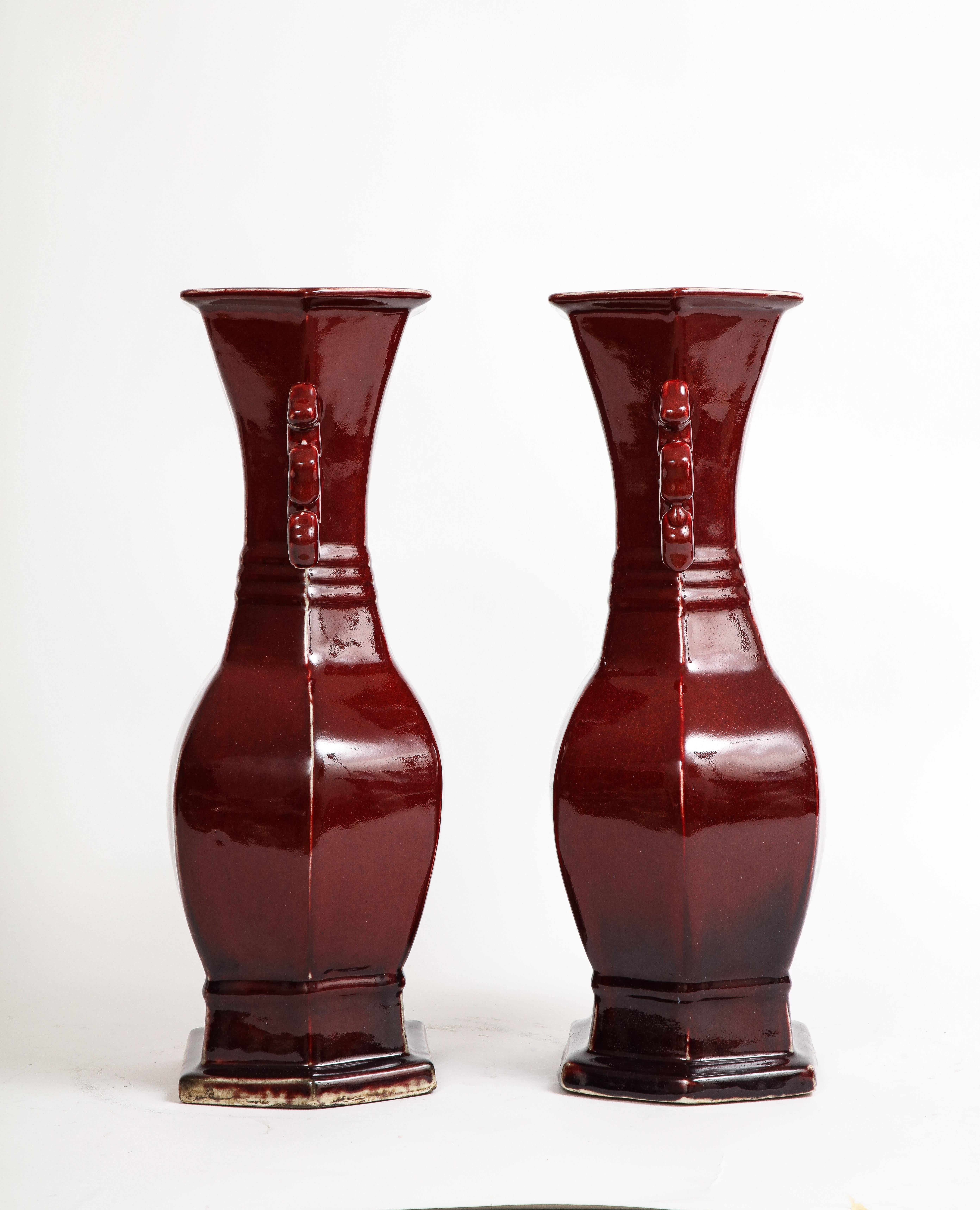 Pair of Chinese Monochrome Ox Blood Porcelain Double Handled Vases For Sale 2