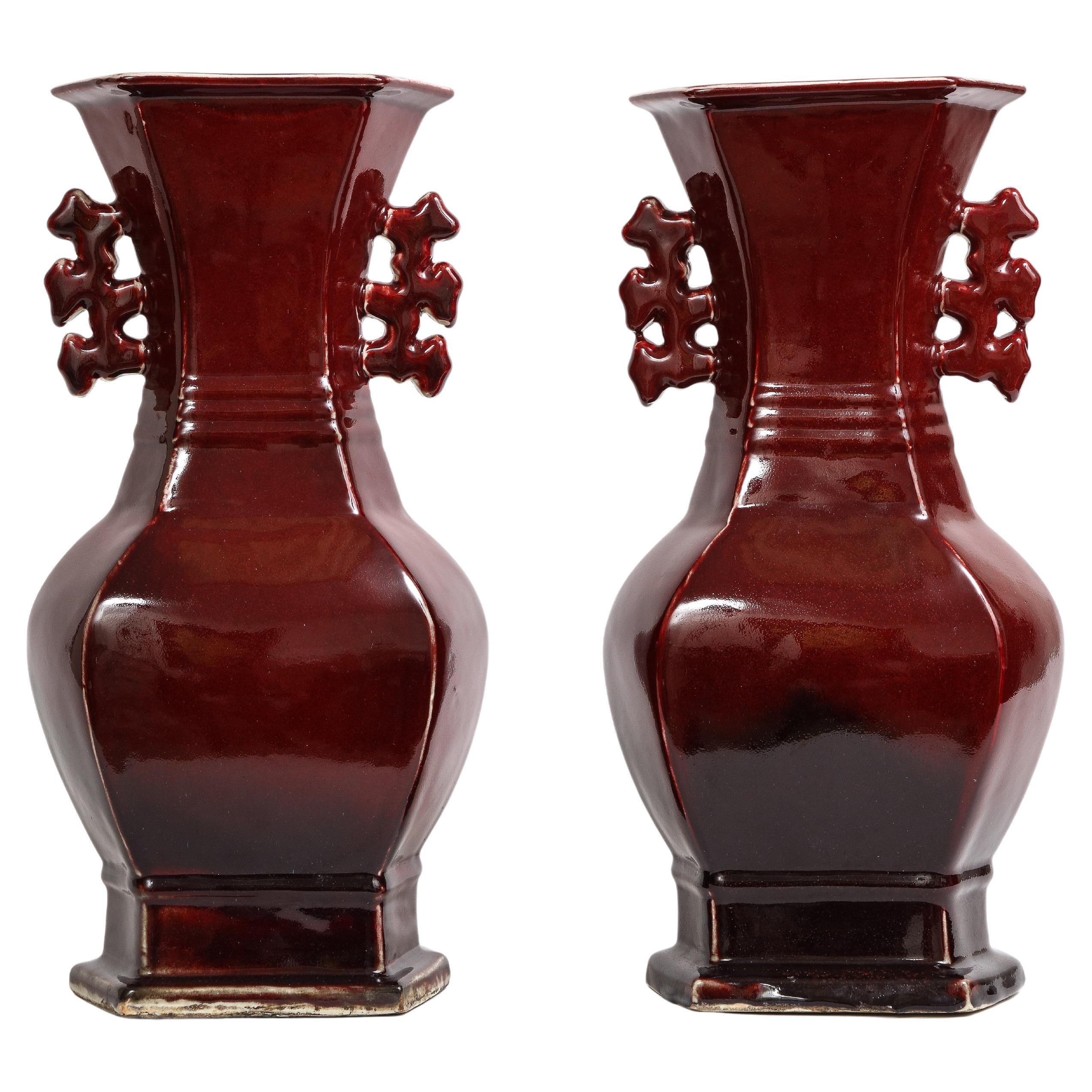 Pair of Chinese Monochrome Ox Blood Porcelain Double Handled Vases