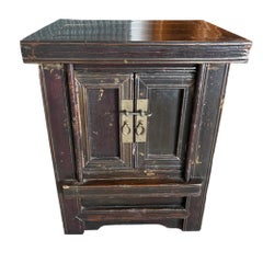 A pair of Chinese Qing Dynasty period bedside cabinets from the 19th century